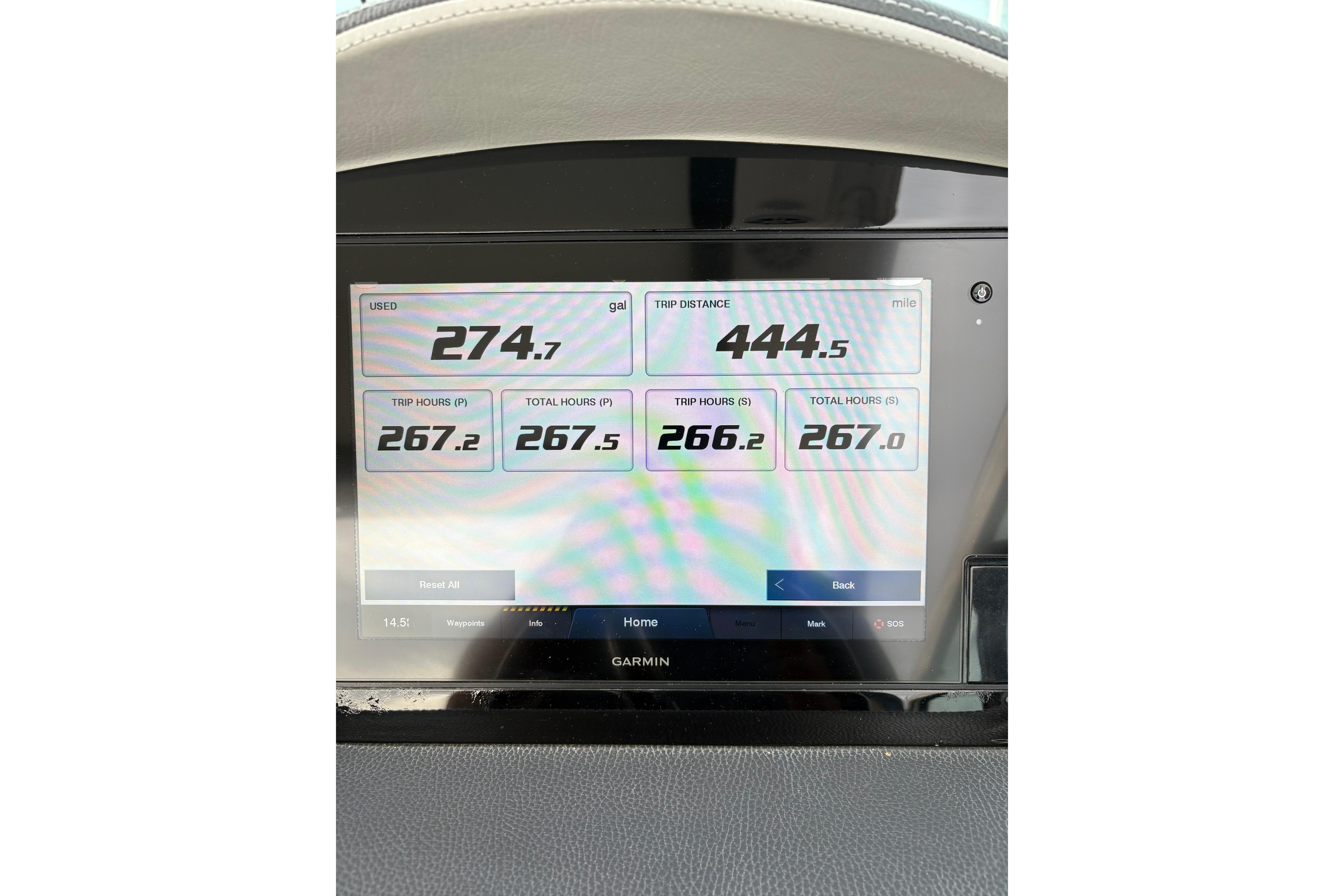 Garmin display on 2021 Regal 33 XO showing fuel usage and trip data.