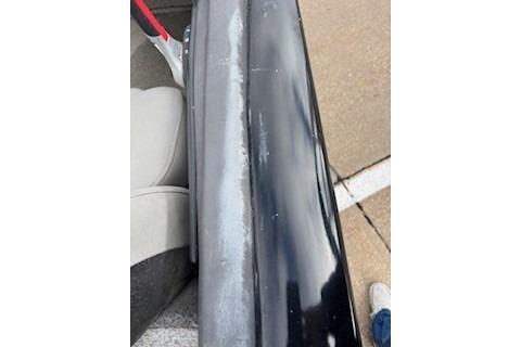 2018 Tracker Pro Team 175 TXW boat showing wear on the black exterior surface.