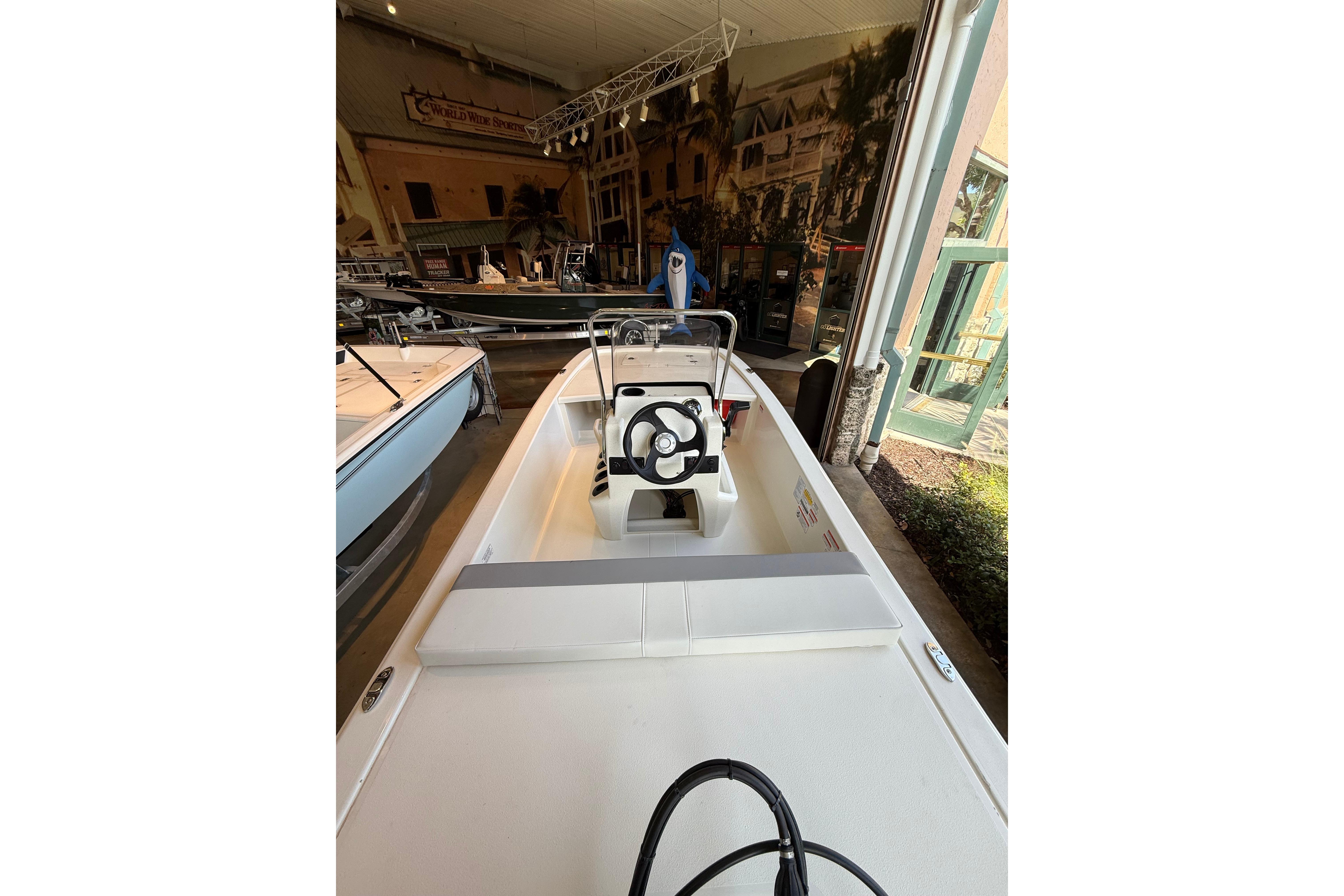 2026 Mako Pro Skiff 13 CC boat interior at showroom display.