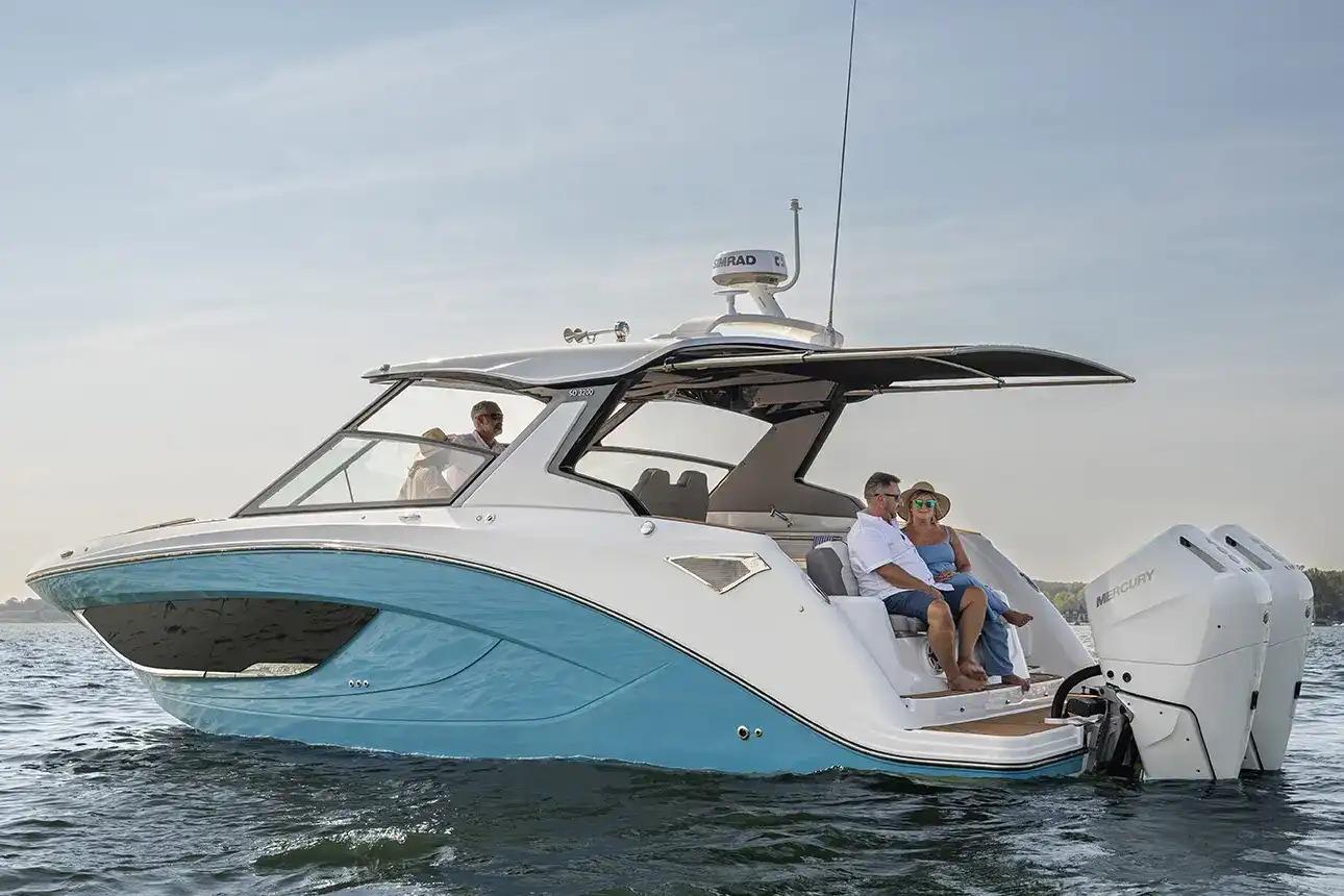 Manufacturer Provided Image: 2026 Hurricane SunDeck 3200 OB boat on water, featuring sleek design and modern amenities.
