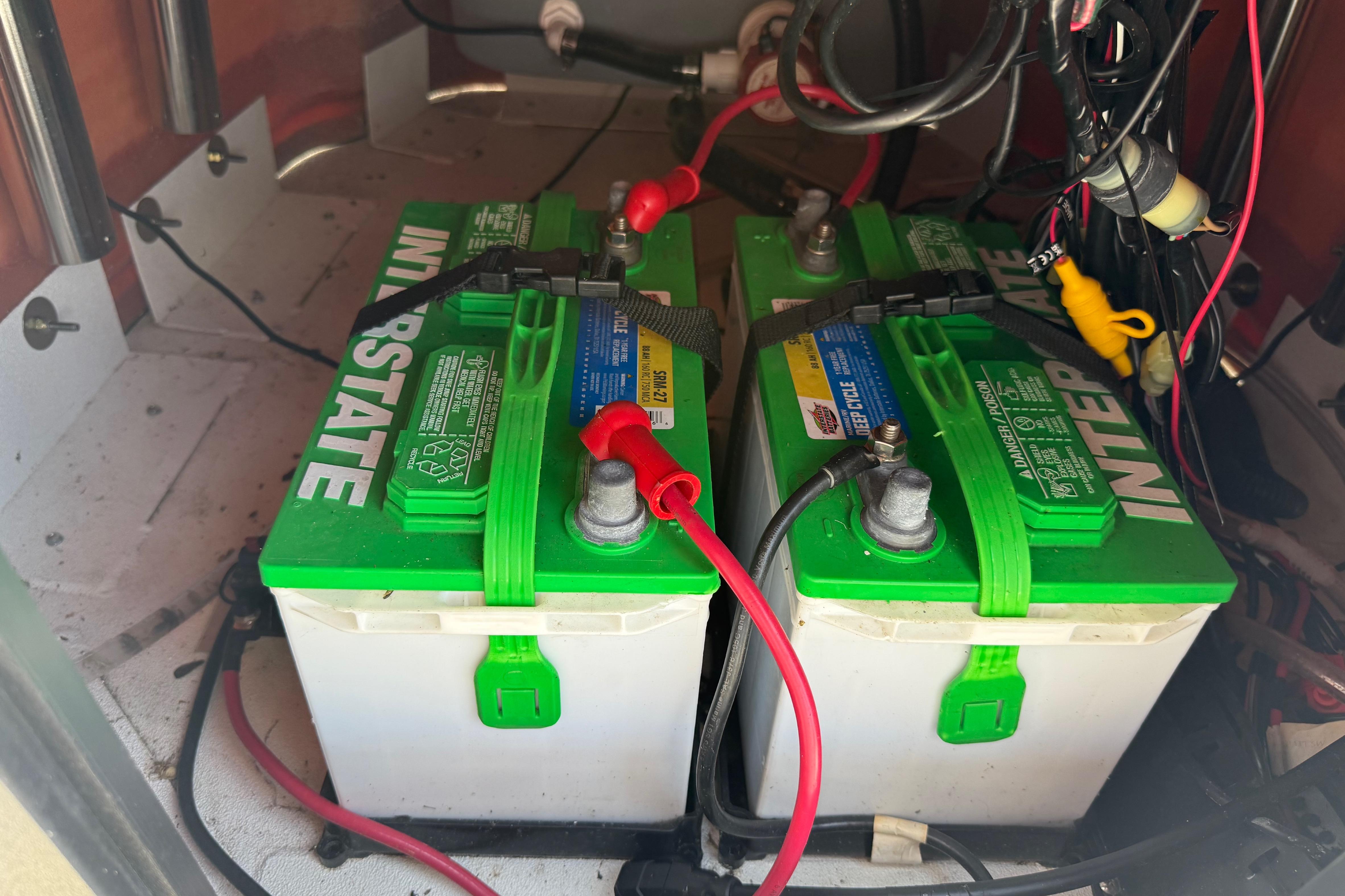 Two Interstate batteries connected in a 2025 Avid 22 Recon vehicle.