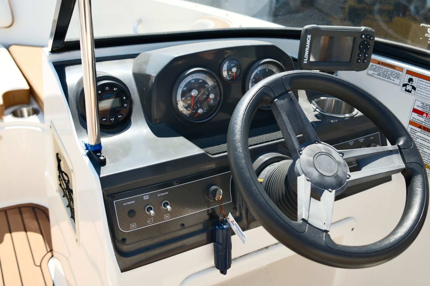 The image shows the dashboard of a 2019 Bayliner VR4 Bowrider OB with steering wheel and instruments.