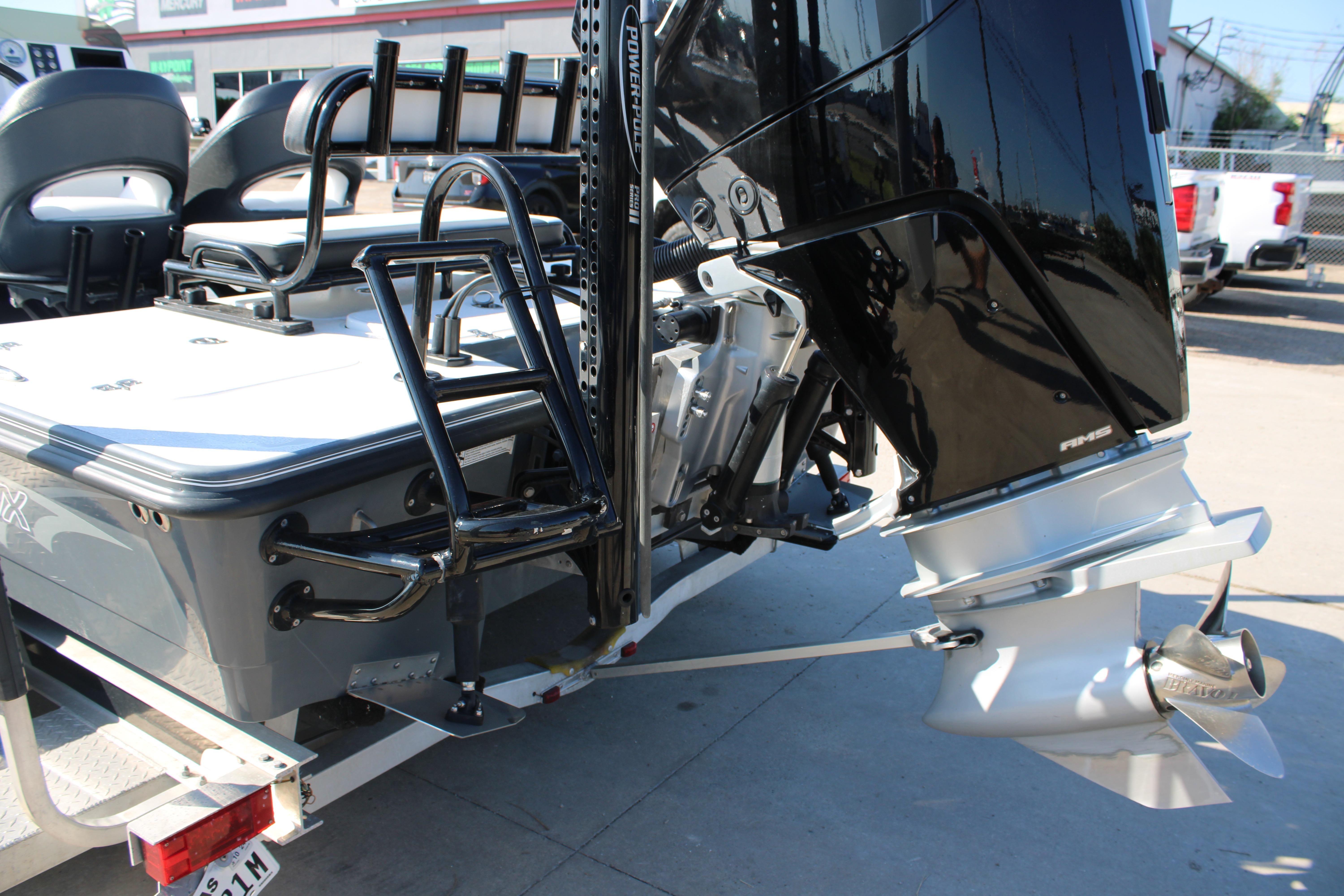 2023 Mamba 24VX boat with powerful outboard motor and sleek design.