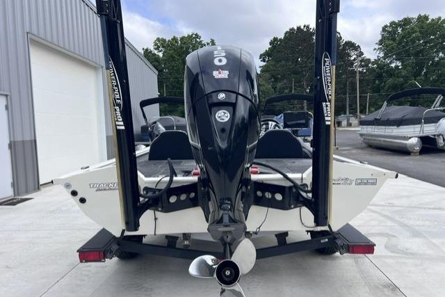 2021 Tracker Pro Team 195 TXW Tournament Edition boat, rear view with motor and Power-Pole anchors.