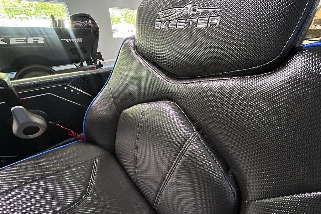 2026 Skeeter ZX200 boat seat with sleek black design and logo detailing.
