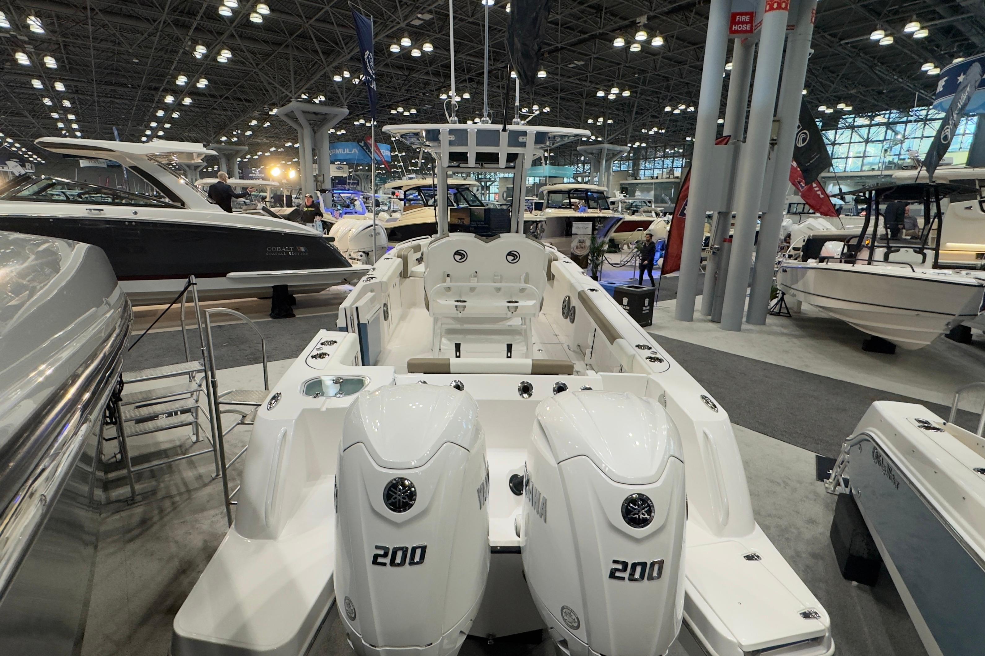 Edgewater 250CC 2026 boat displayed at a show.