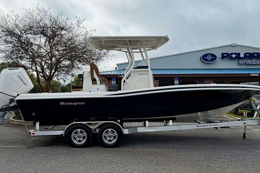 2026 Ranger 2600 Bay boat on trailer outside dealership.