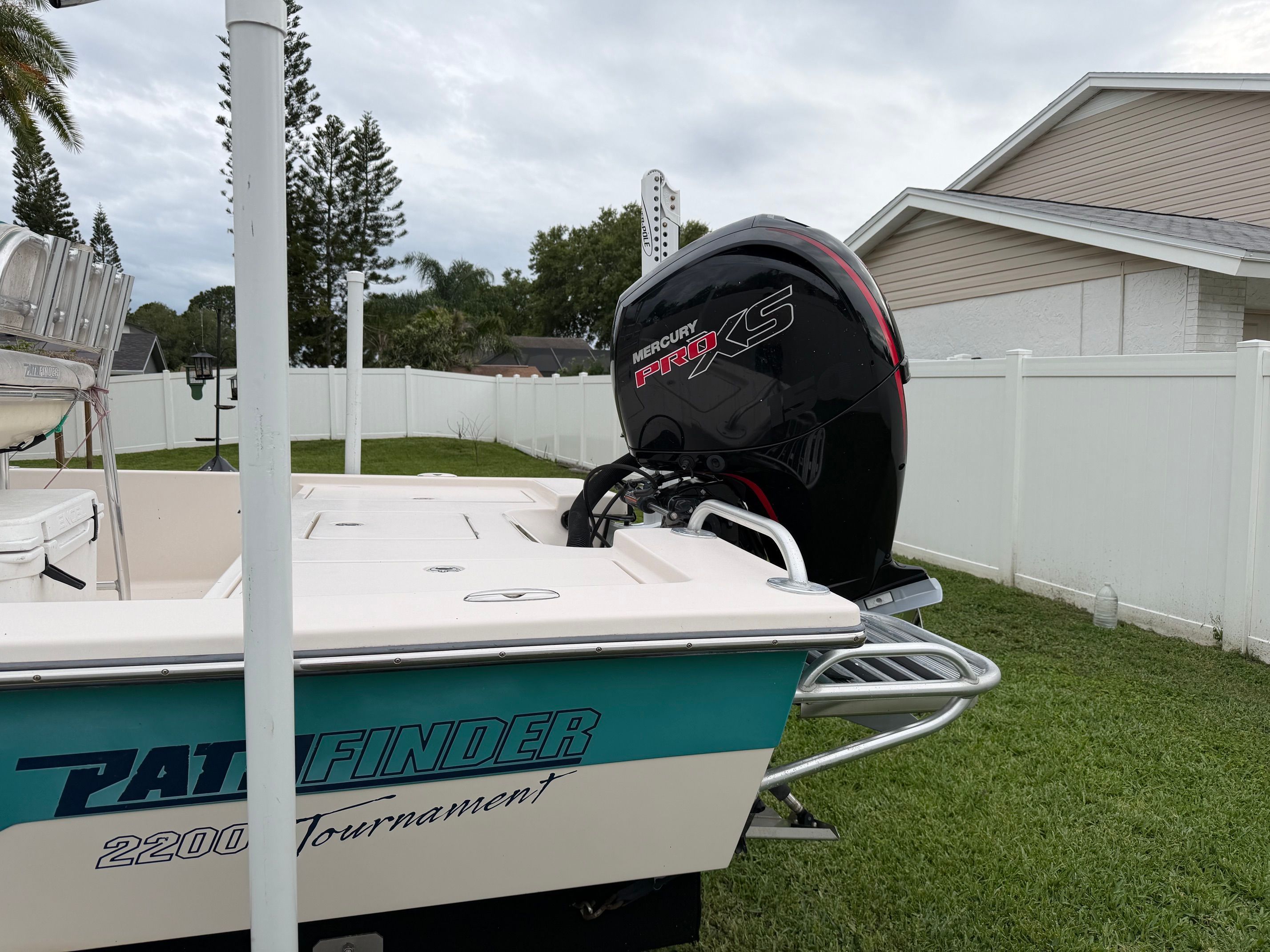 A 2006 Pathfinder 2200 Tournament Edition boat with a Mercury Pro XS outboard motor.