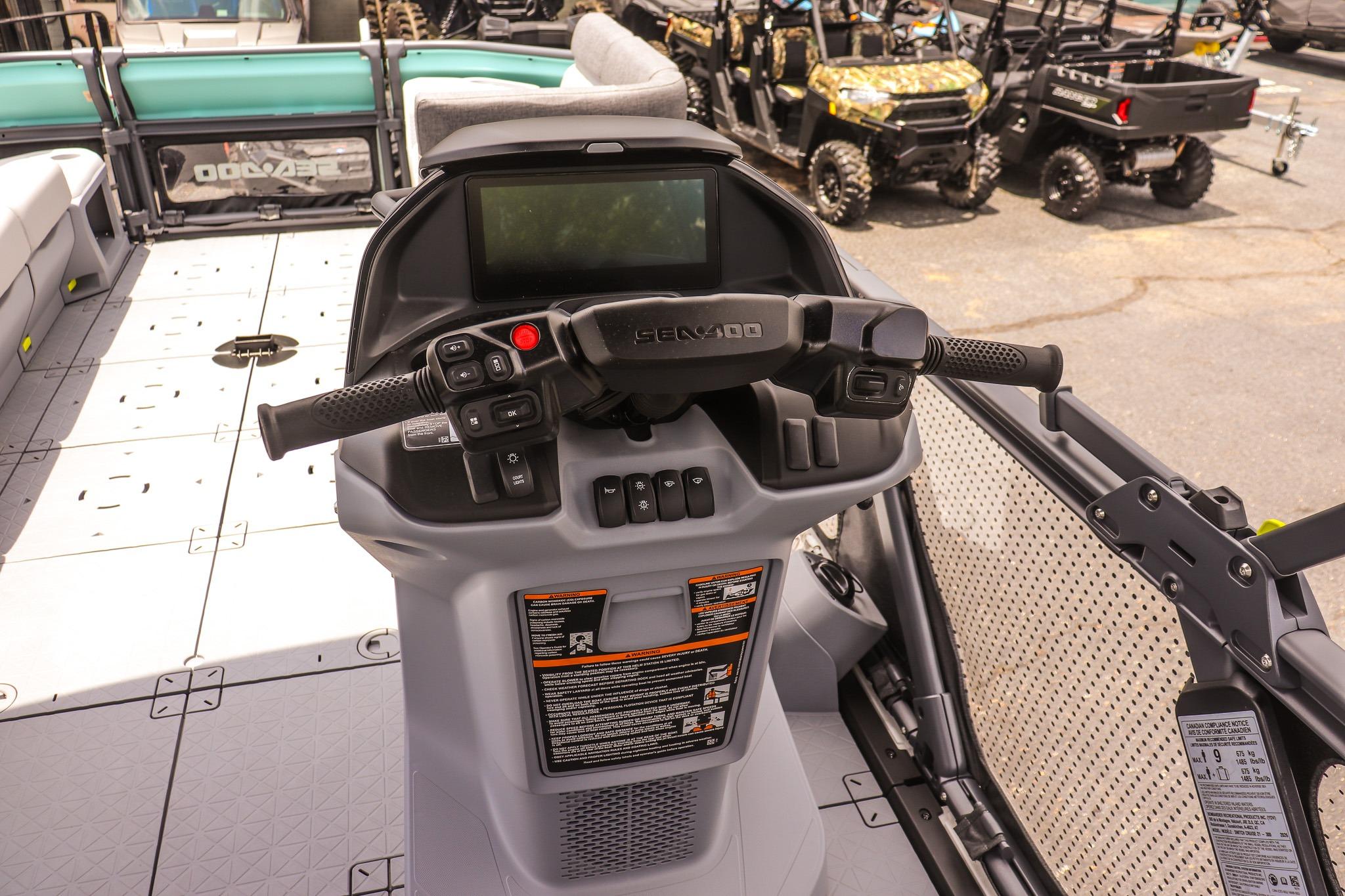 2026 Sea-Doo Switch Cruise 21 dashboard with steering controls and display screen.