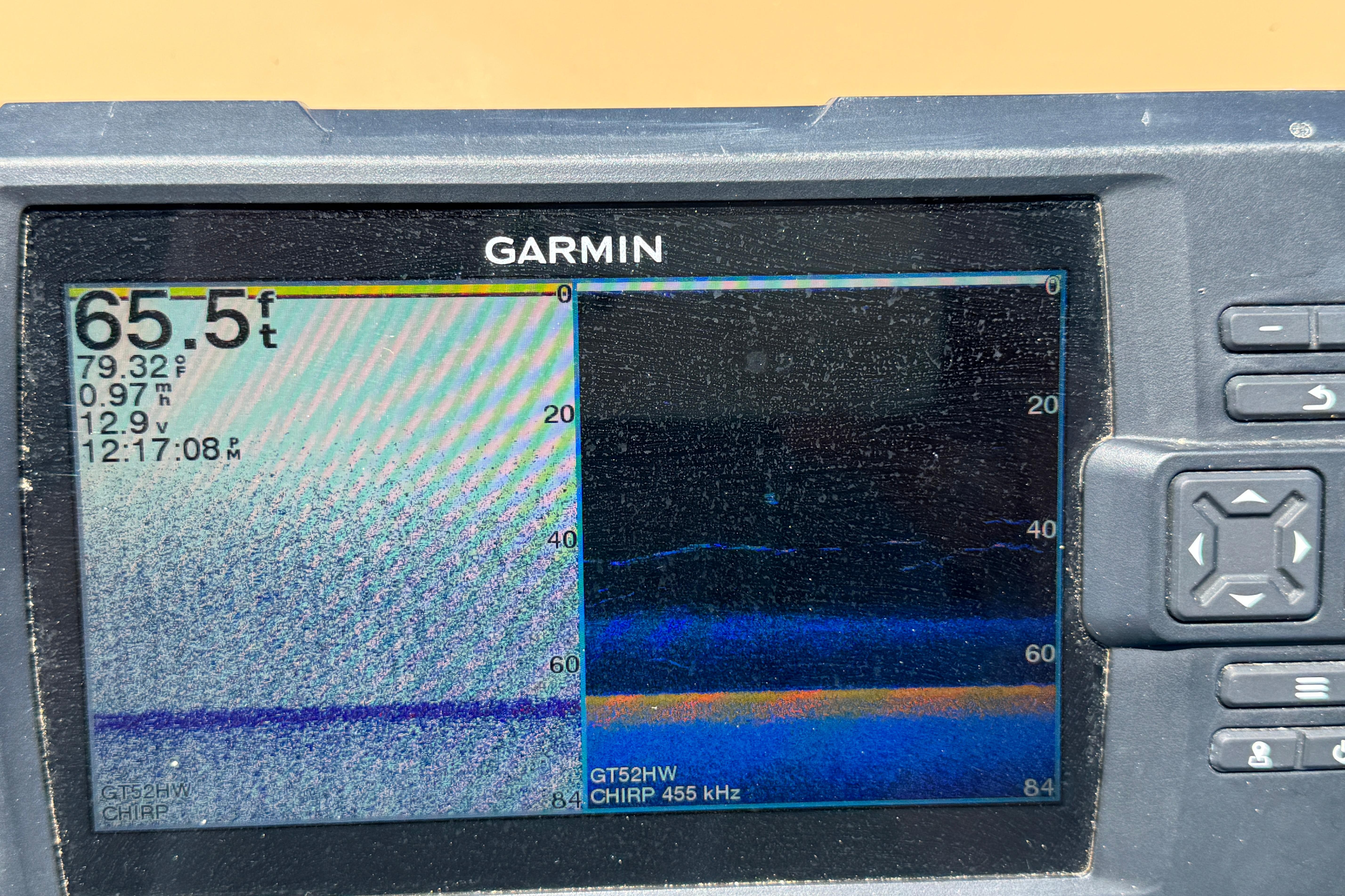 Garmin sonar display on 2002 Carver 396 Motor Yacht showing depth and temperature readings.