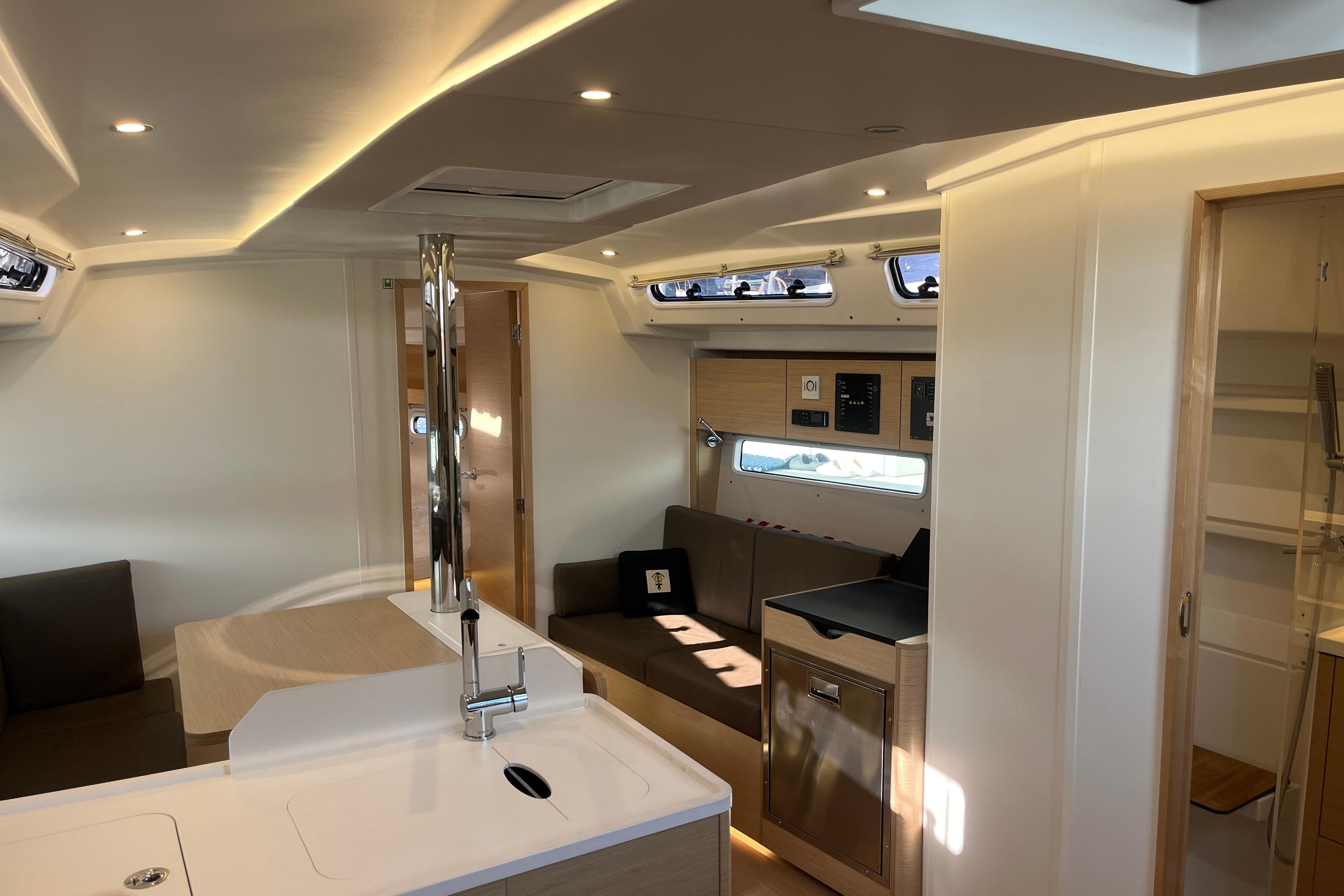 Modern interior of 2025 Hanse 360 yacht, featuring sleek design and comfortable seating.