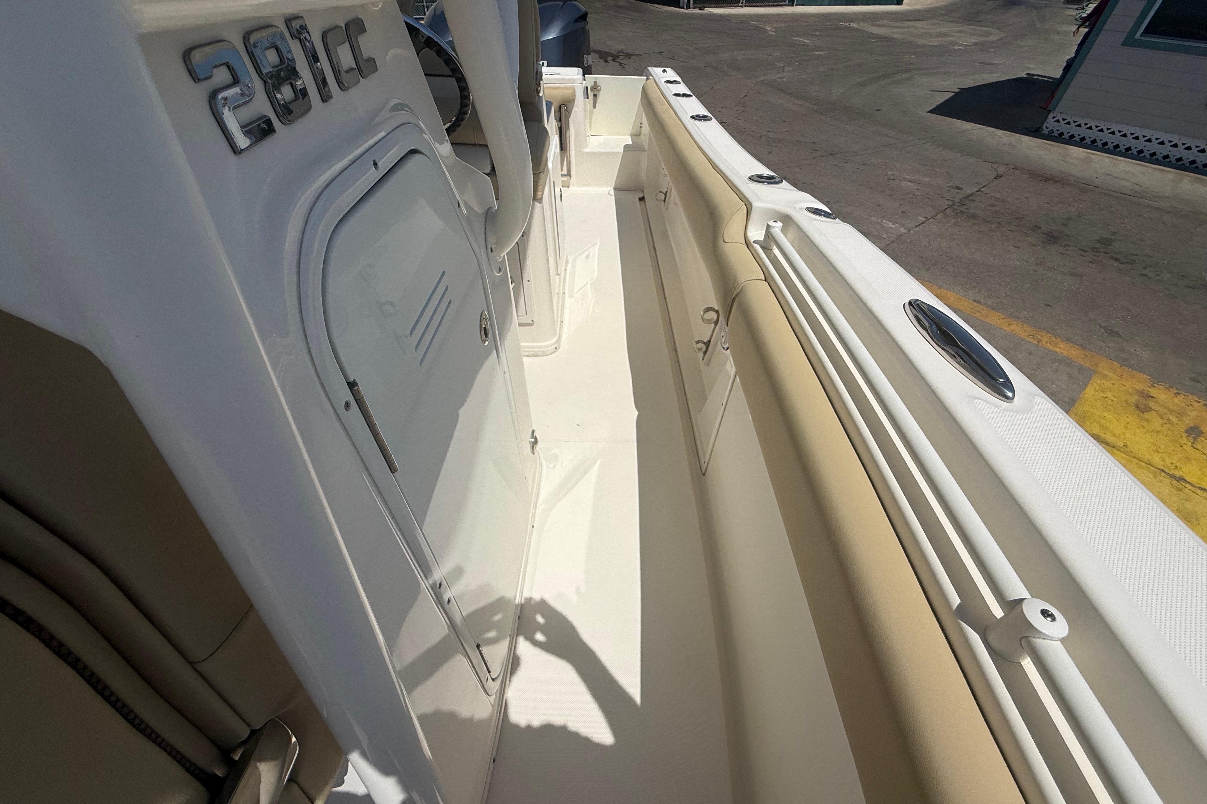 2019 Key West Billistic 281 Center Console boat interior, featuring sleek design and storage compartments.