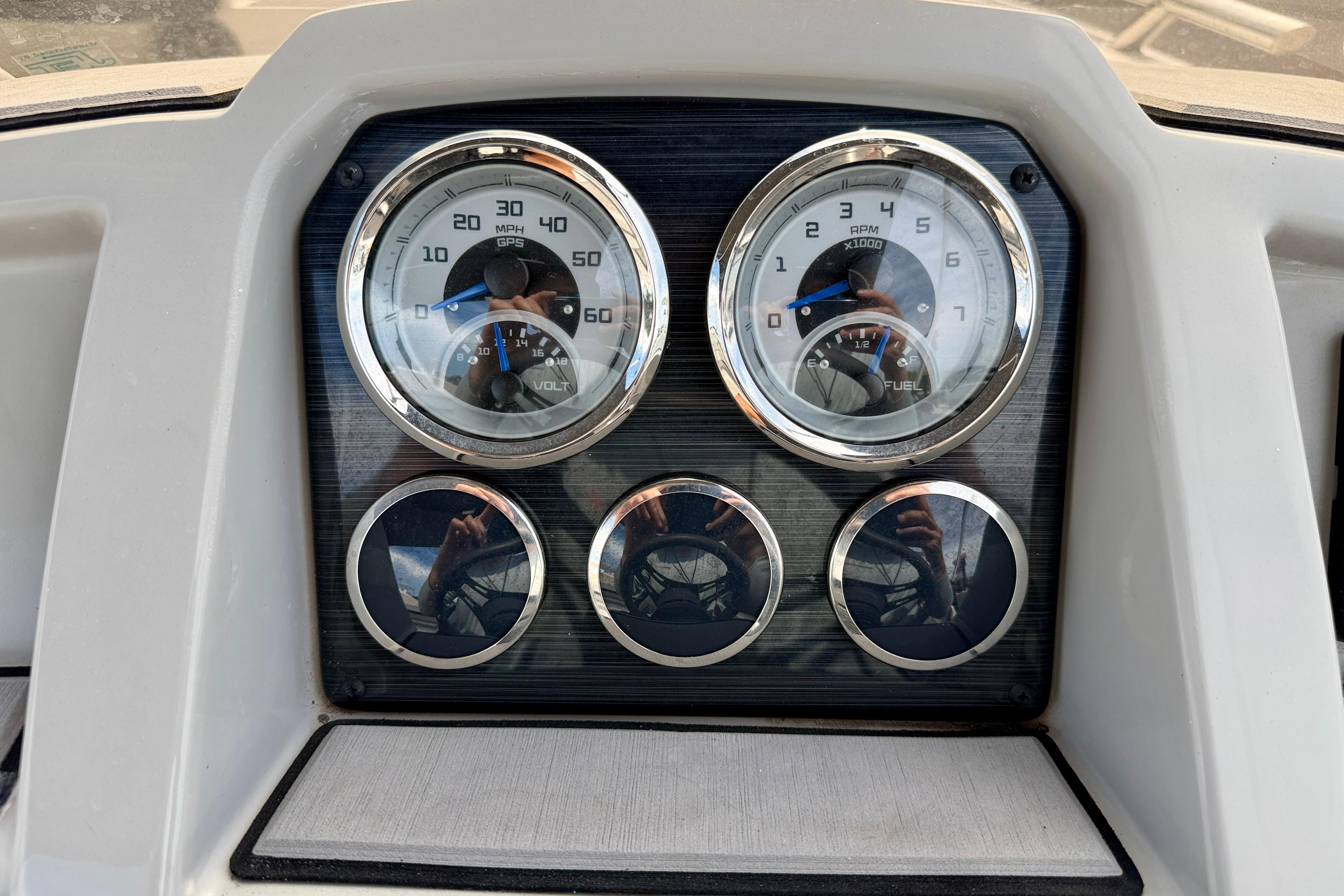 Dashboard of 2021 Starcraft SVX 191 OB boat with speedometer and tachometer gauges.