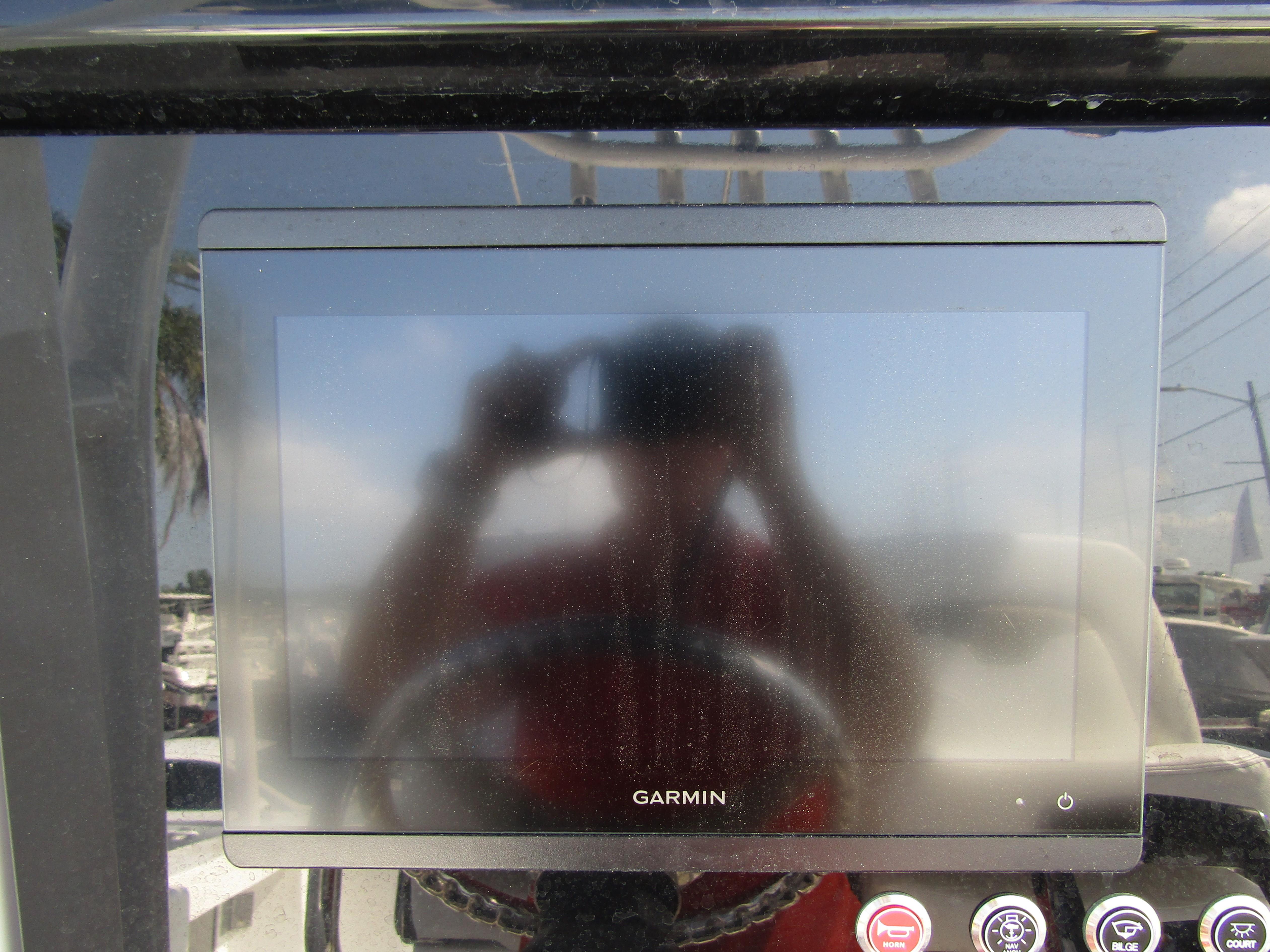 Garmin display on 2024 Wellcraft 263 Fisherman boat dashboard.