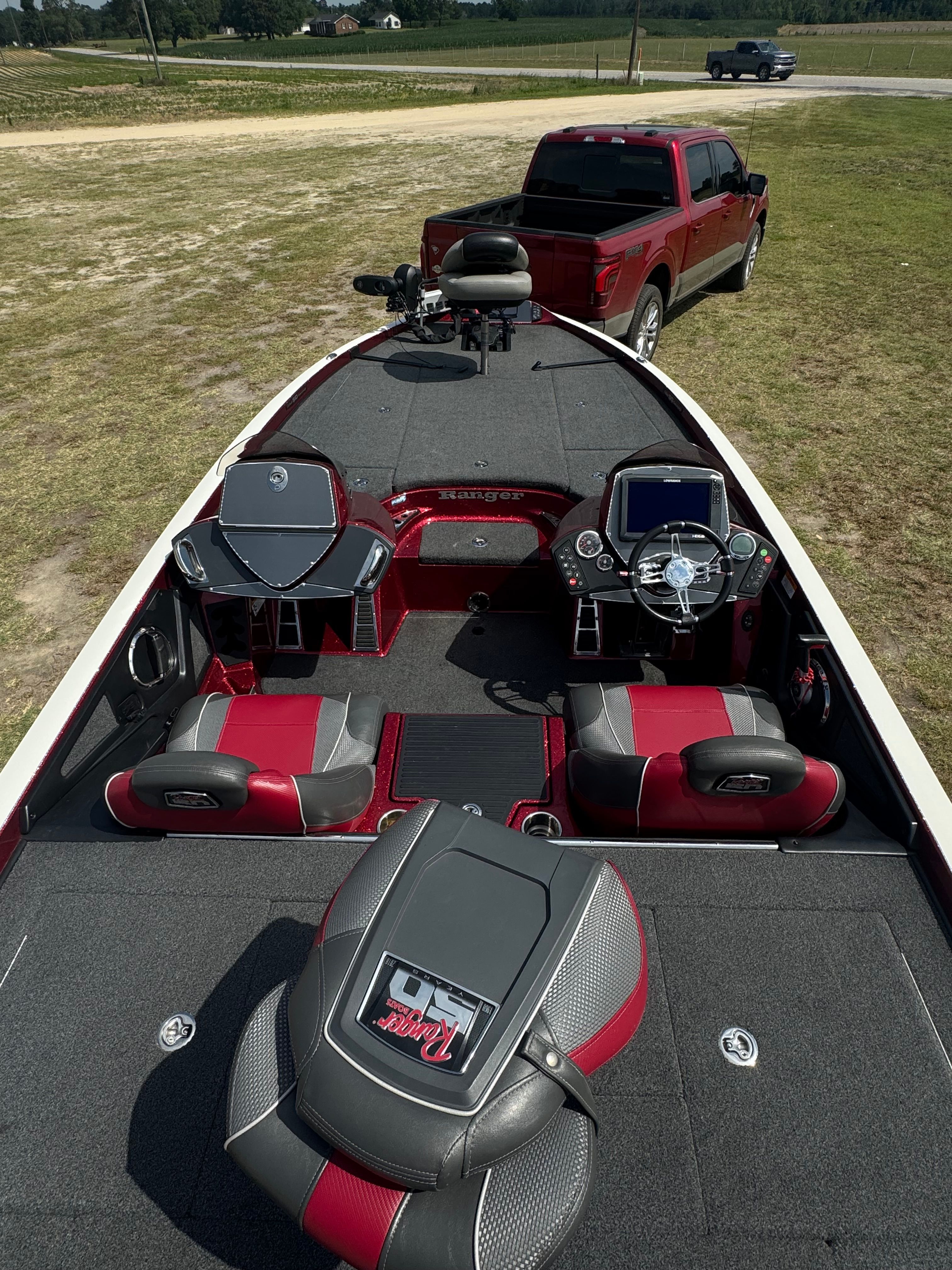 A 2018 Ranger 521C boat is mounted on a trailer, ready for transport.