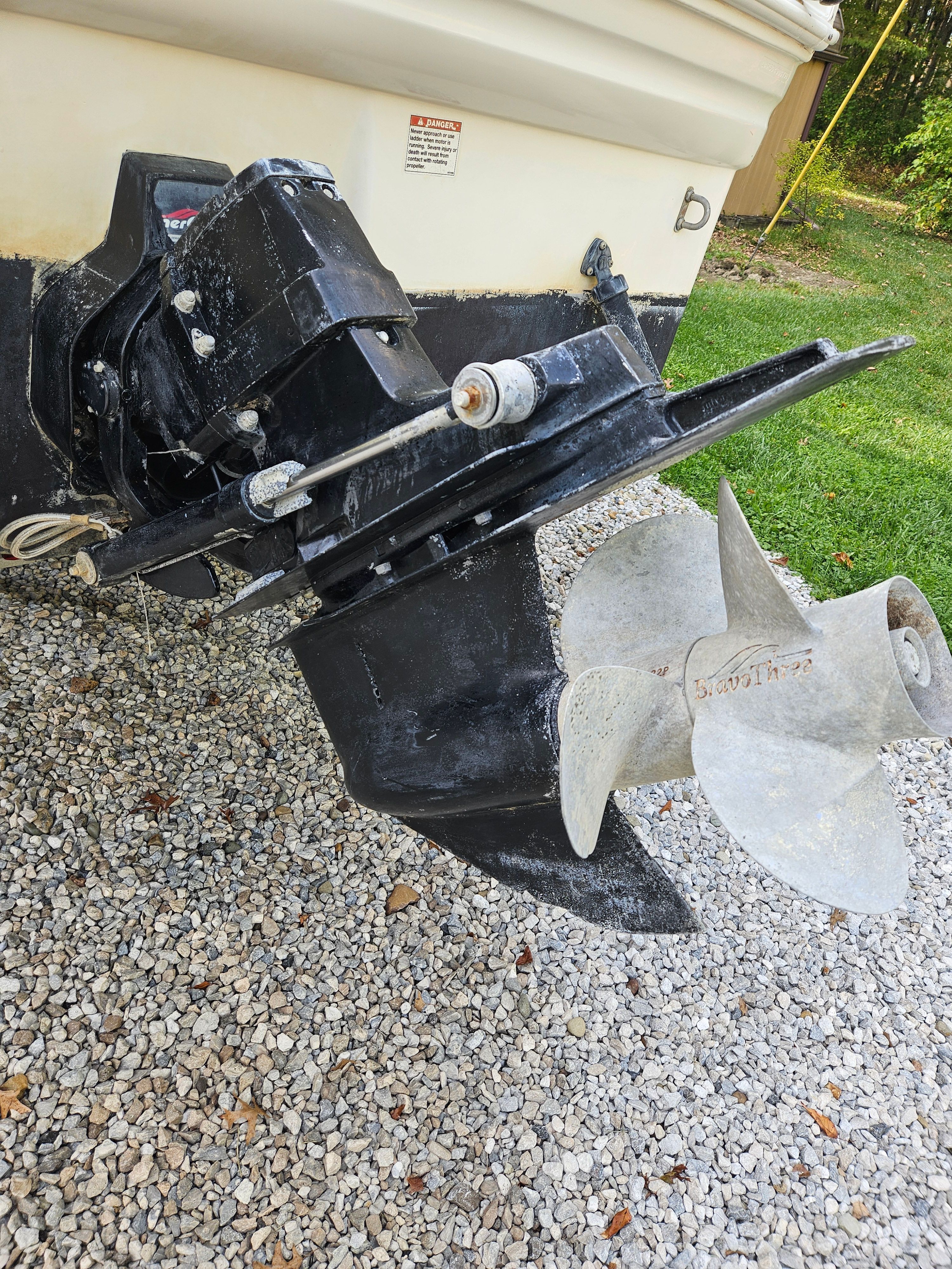 1998 Larson Cabrio 254 boat motor and propeller.