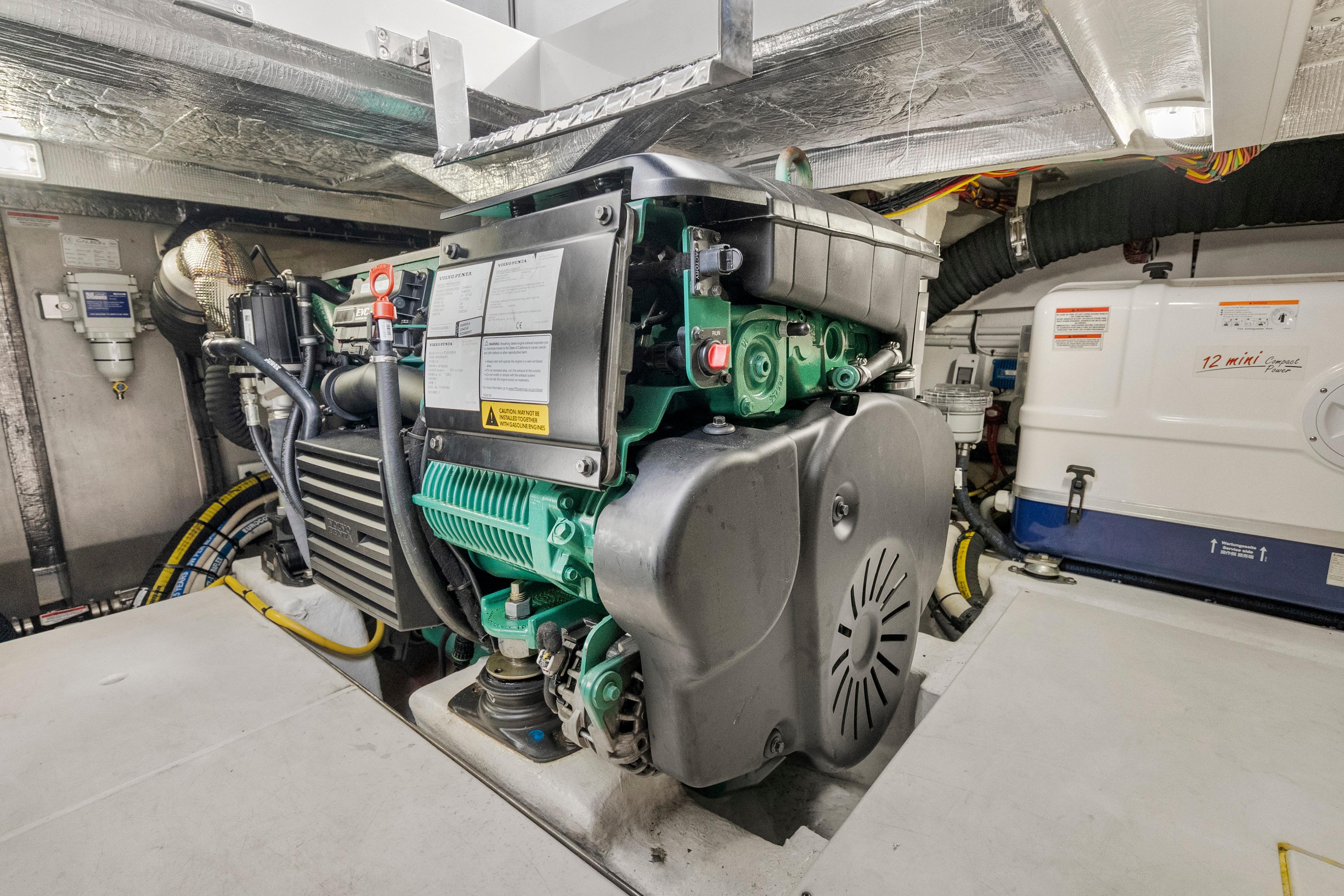 Engine room of 2023 Galeon 400 Fly yacht, showcasing modern machinery and equipment.