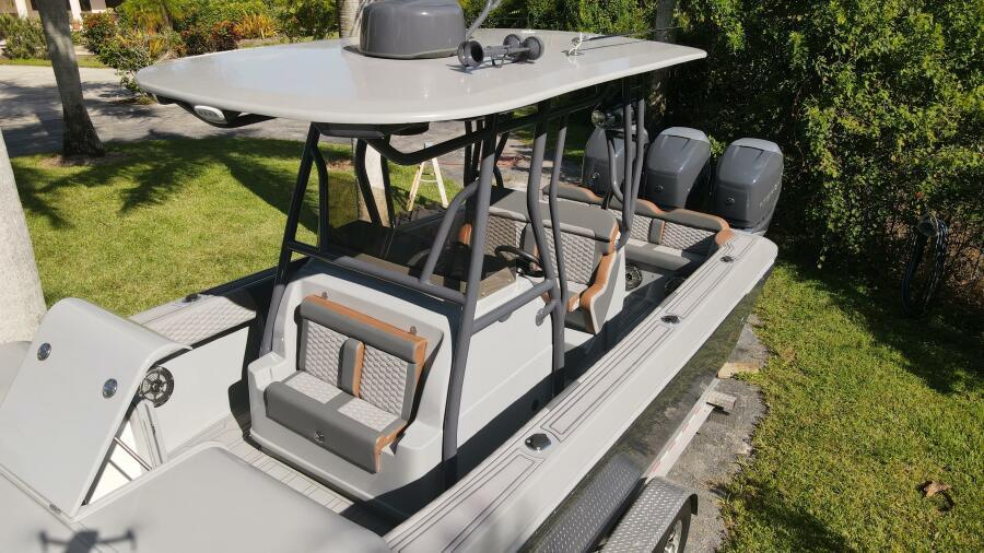 1996 Formula 382 SR1 boat with dual engines, sleek design, and spacious seating.