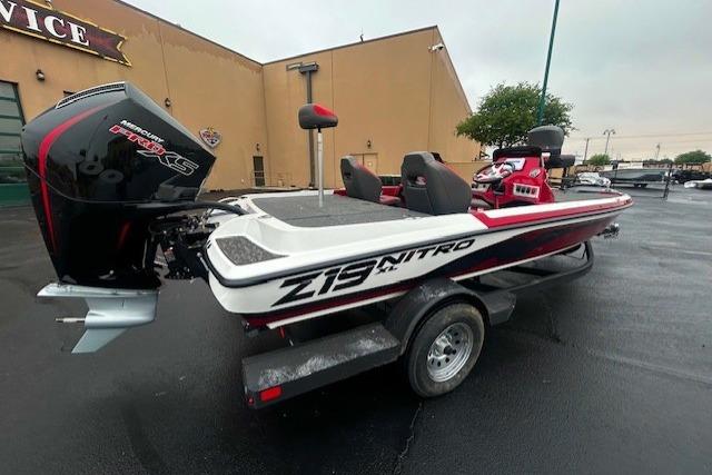 2026 Nitro Z19 XL boat with powerful engine, parked outdoors on a trailer.
