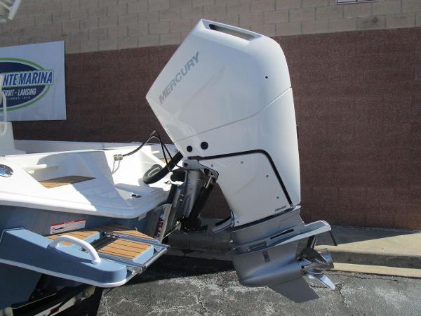 2024 Ranger 2660 Bay boat with Mercury outboard motor, docked at a marina.