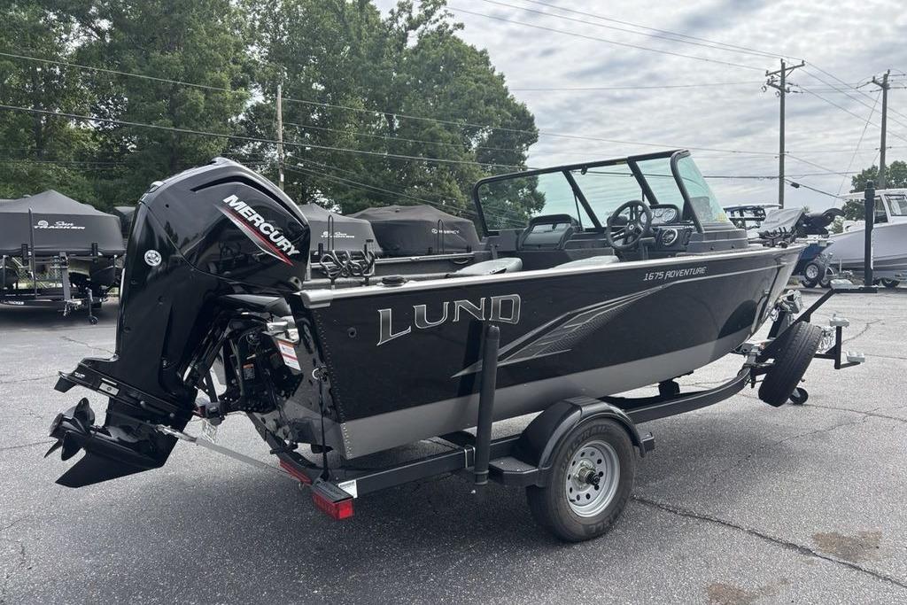 2021 Lund 1675 Adventure Sport boat on trailer with Mercury outboard motor.