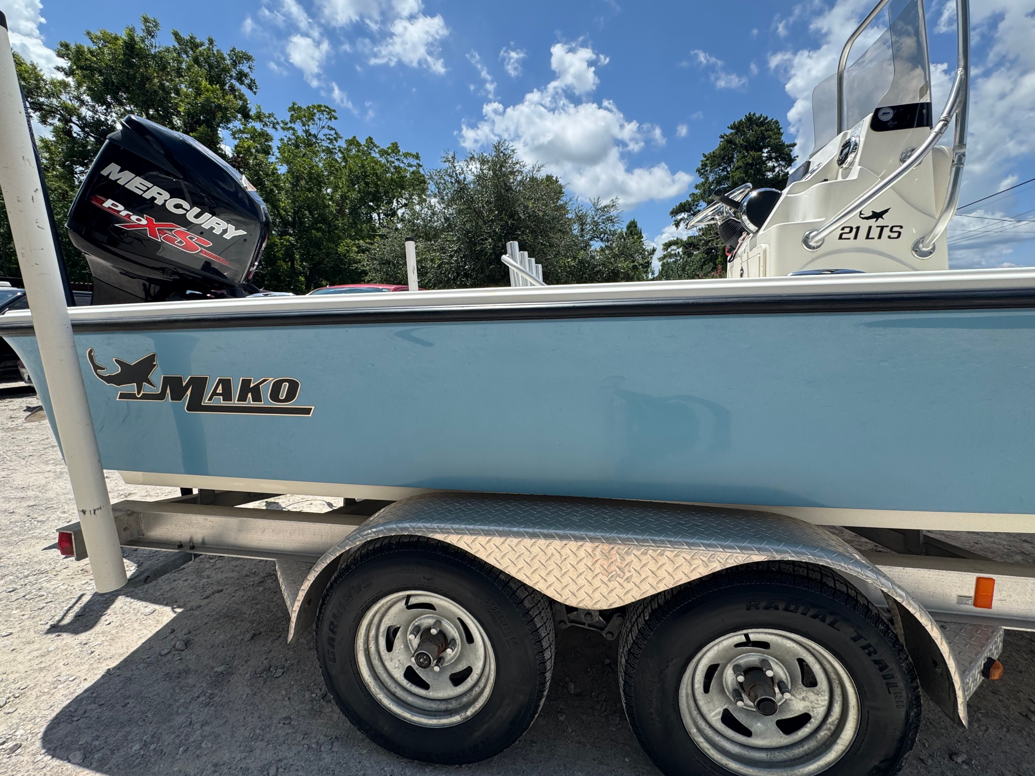 2014 Mako 21 LTS boat with Mercury engine on trailer.