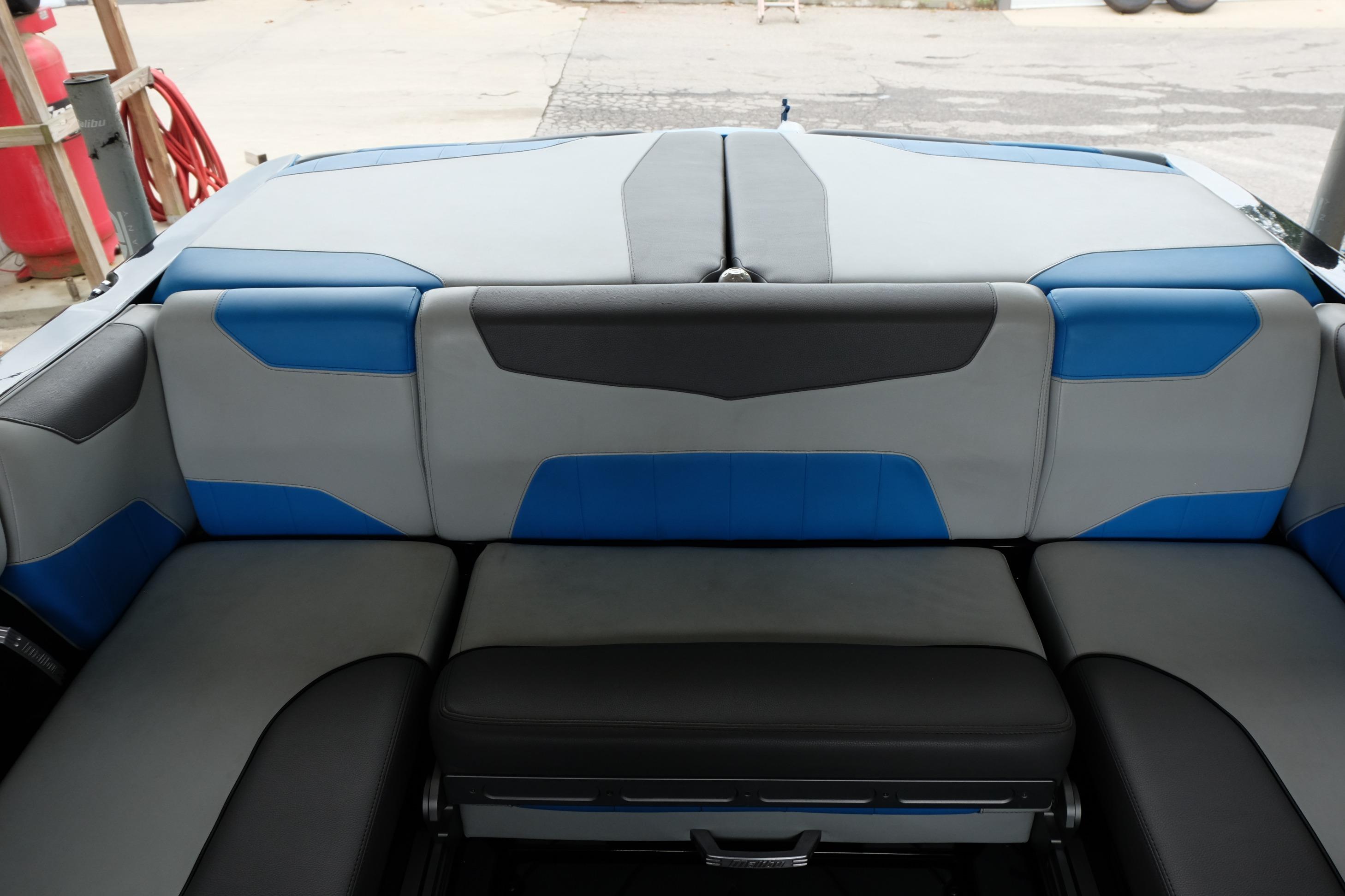 2020 Malibu Wakesetter 23 LSV interior seating with blue and gray upholstery.