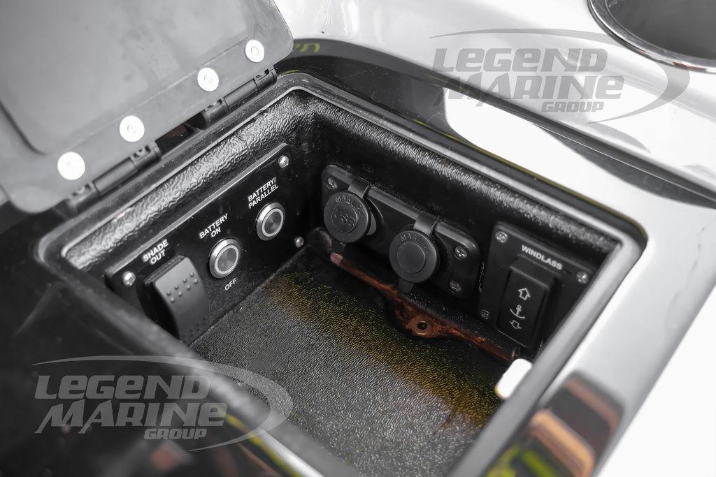 Control panel of 2024 Statement 350 Open boat with switches and sockets.