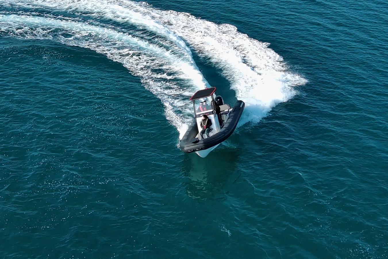 Aerial view of 2026 Northstar VEGA 6.4 boat cruising on blue ocean waters.