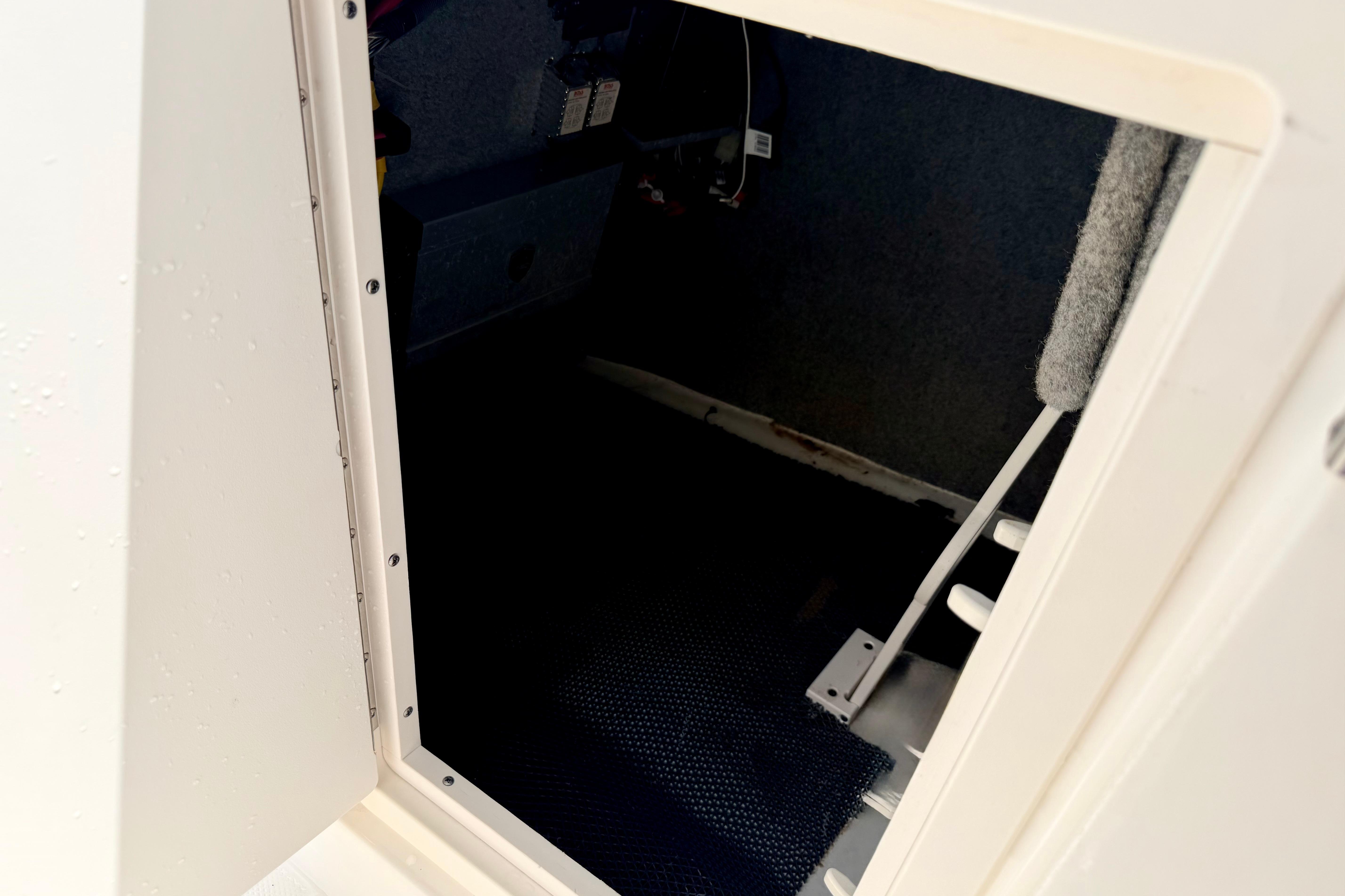 2015 Chaparral Sunesta 264 interior cabin entrance with visible steps.