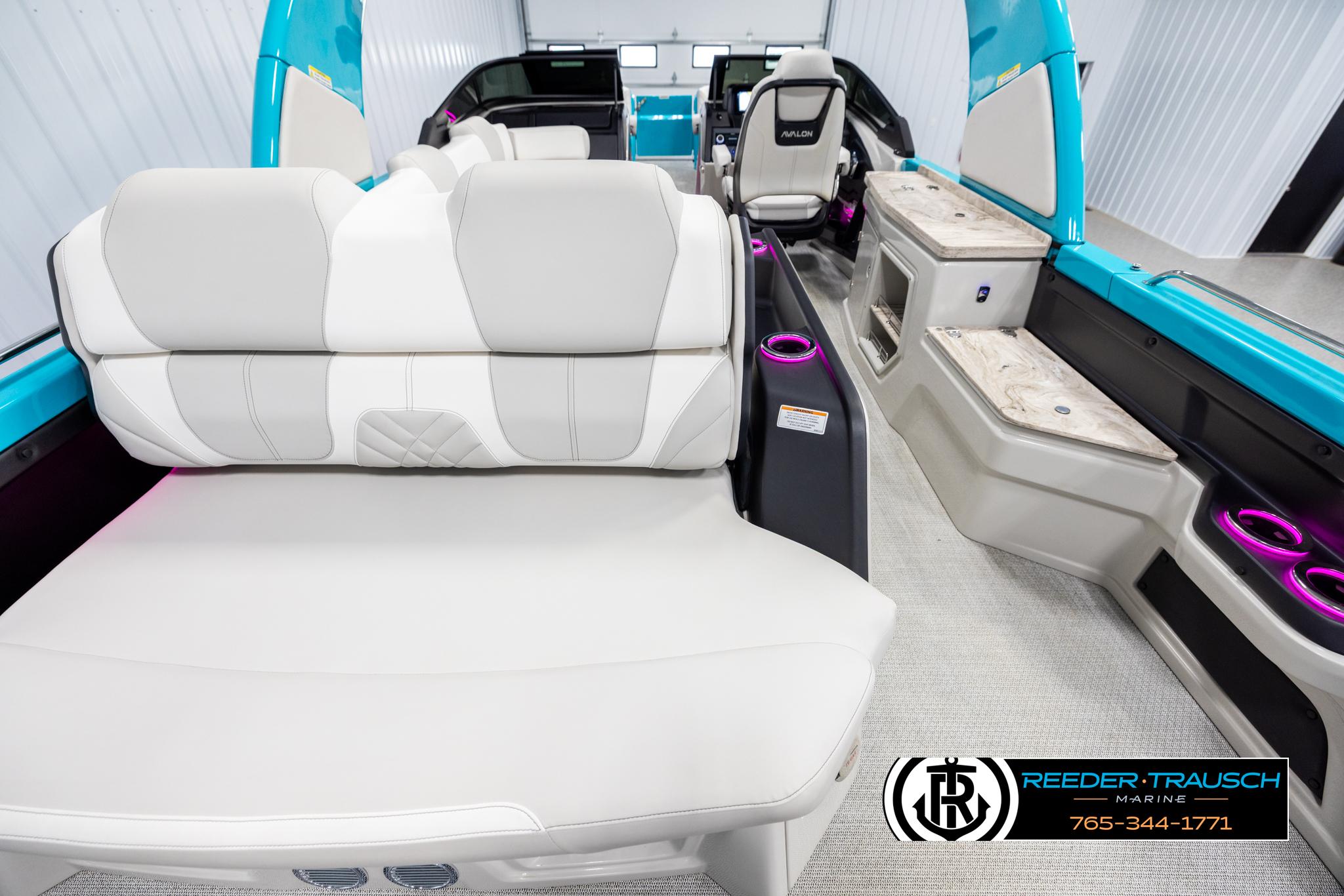 Luxurious interior of 2025 Avalon 2585 Excal VRBW boat with modern seating and ambient lighting.