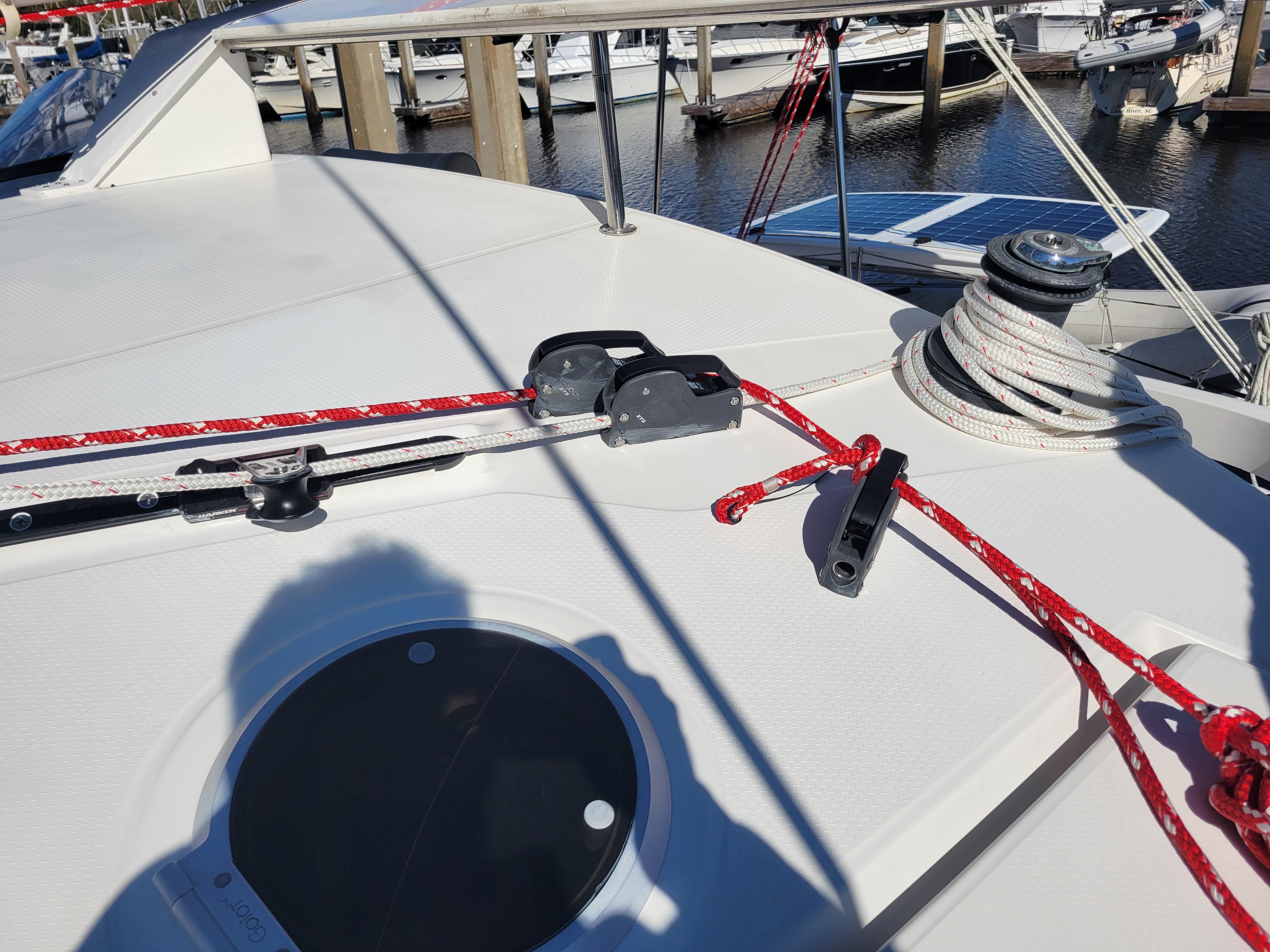 Deck of 2006 Fountaine Pajot LAVEZZI catamaran with ropes and winch.