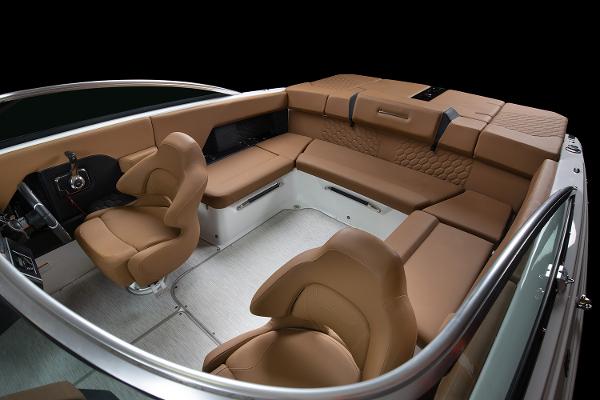 Manufacturer Provided Image: 2025 Four Winns H4 boat interior with luxurious brown seating and modern design.