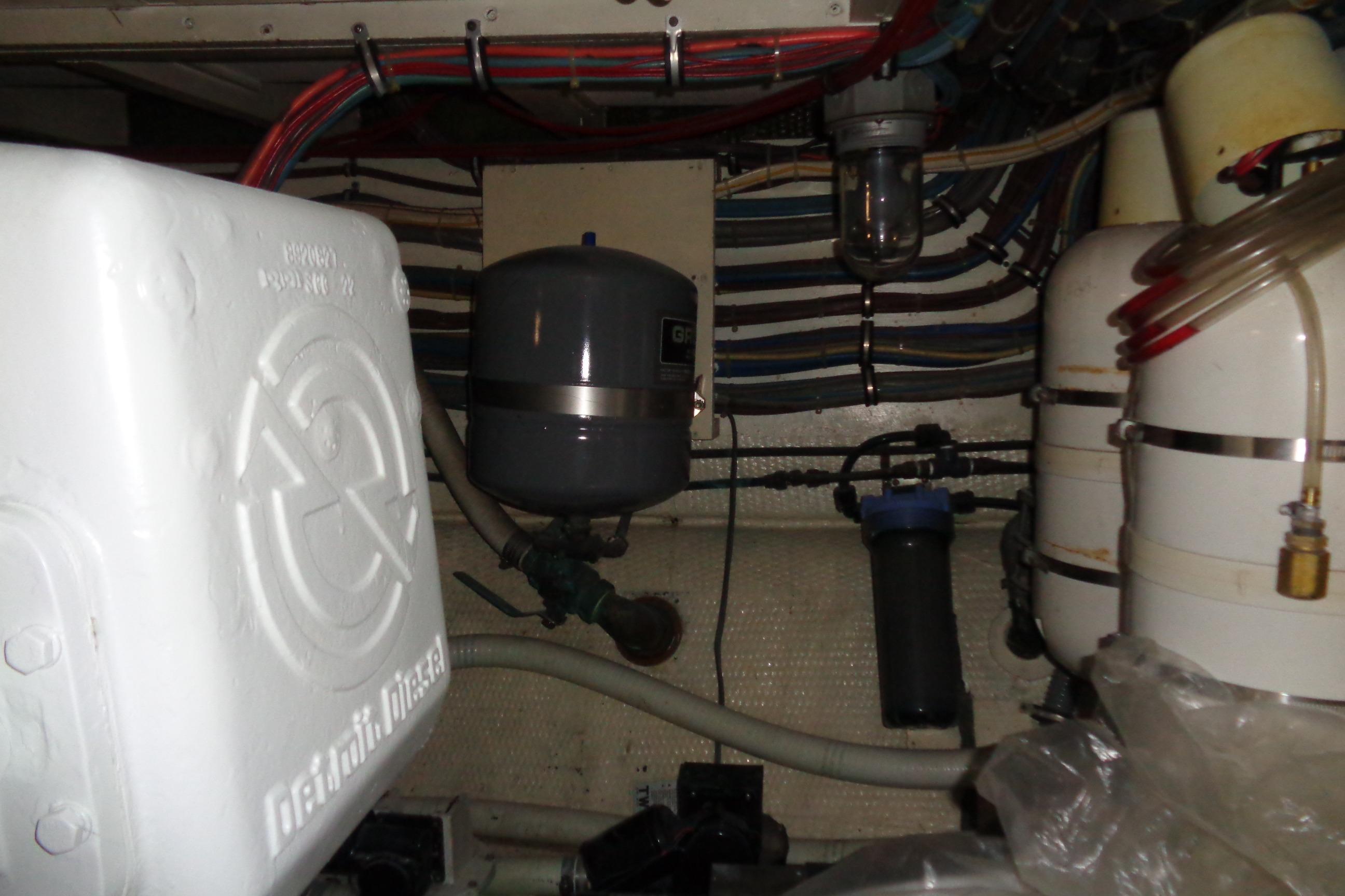 Engine room of 1981 Hatteras 48 Cockpit Motor Yacht with Detroit Diesel components.