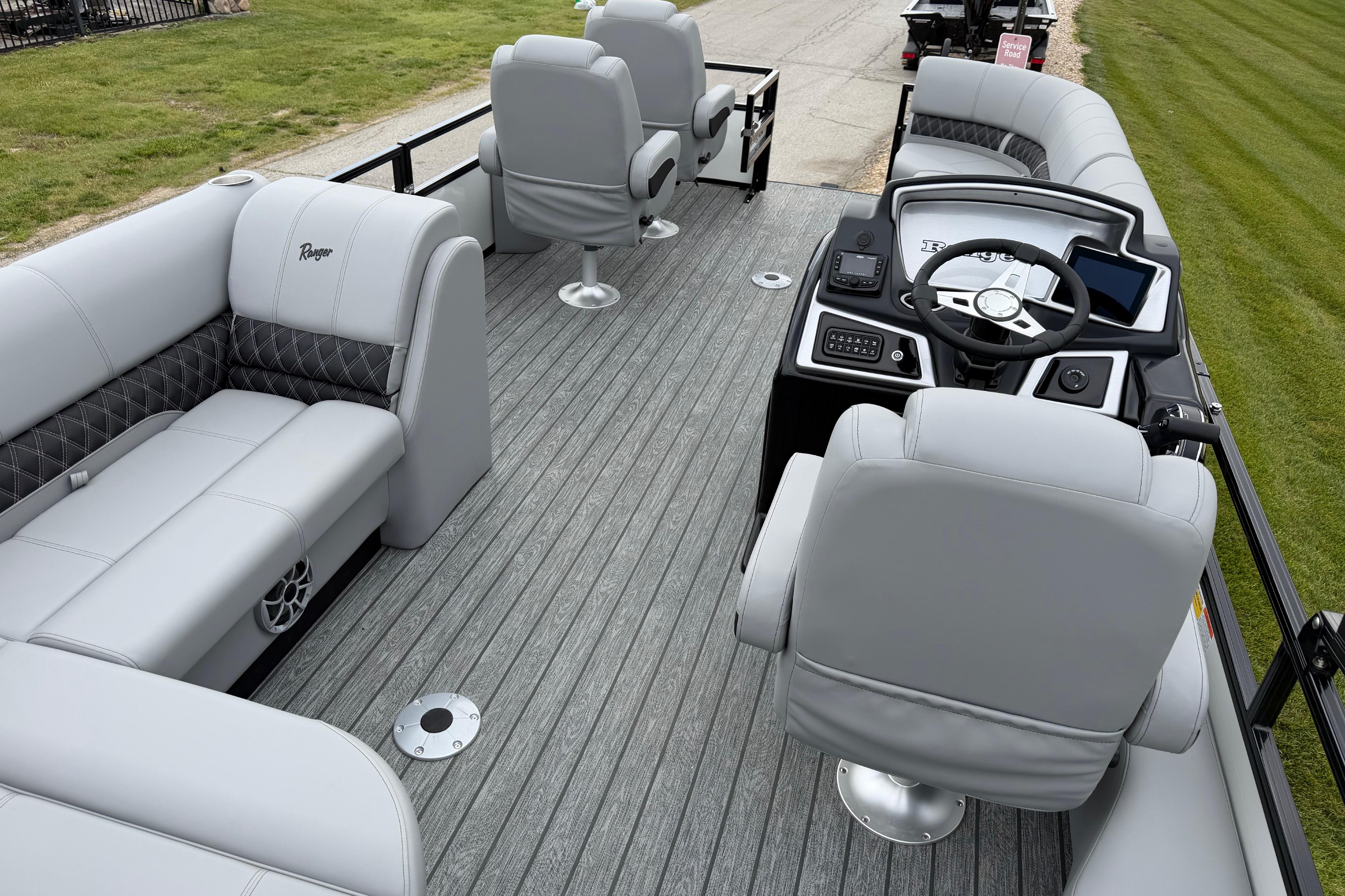 2026 Ranger 220FC boat interior with plush seating and modern helm controls.