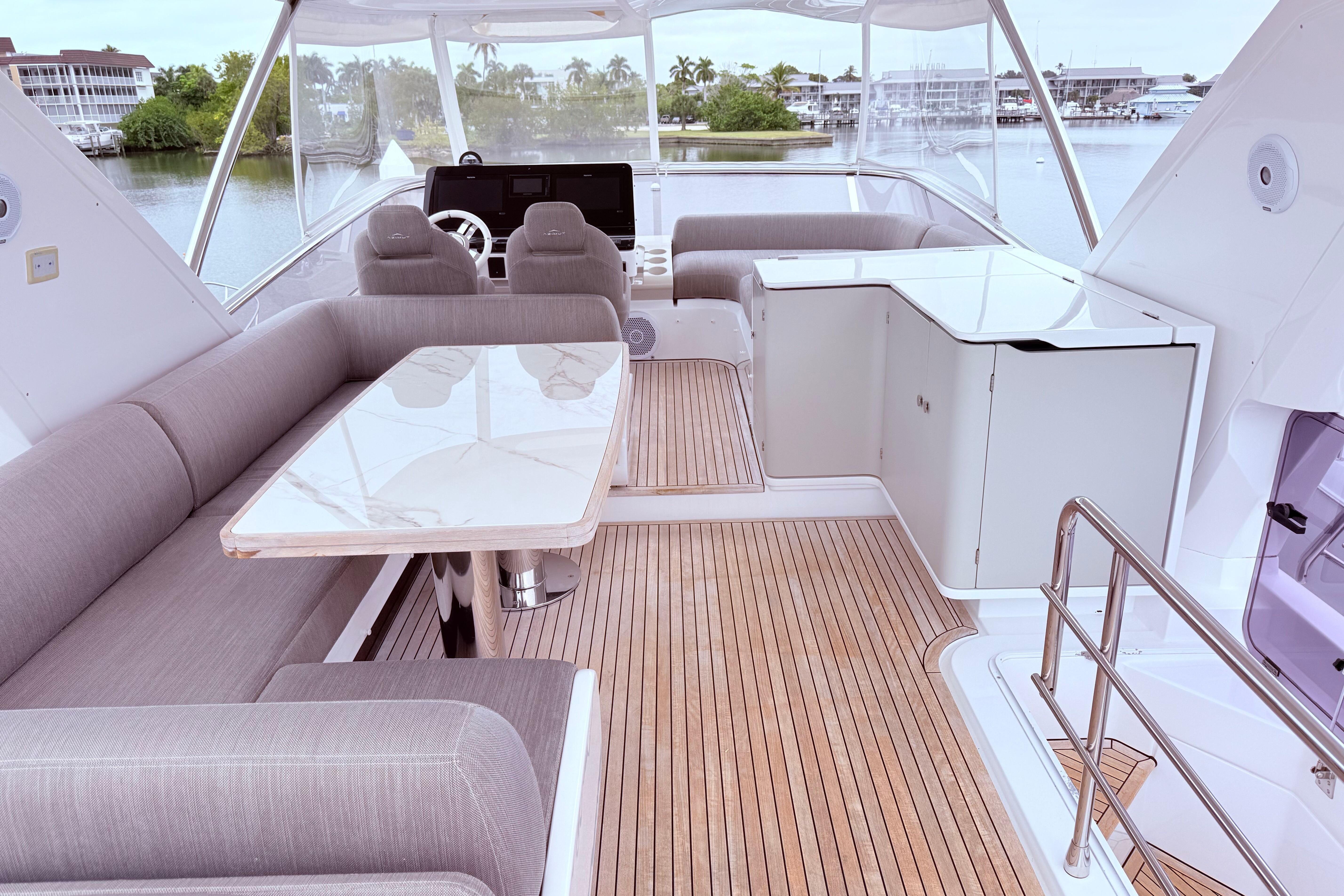 Luxurious 2020 Azimut 60 yacht interior with elegant seating and modern design.