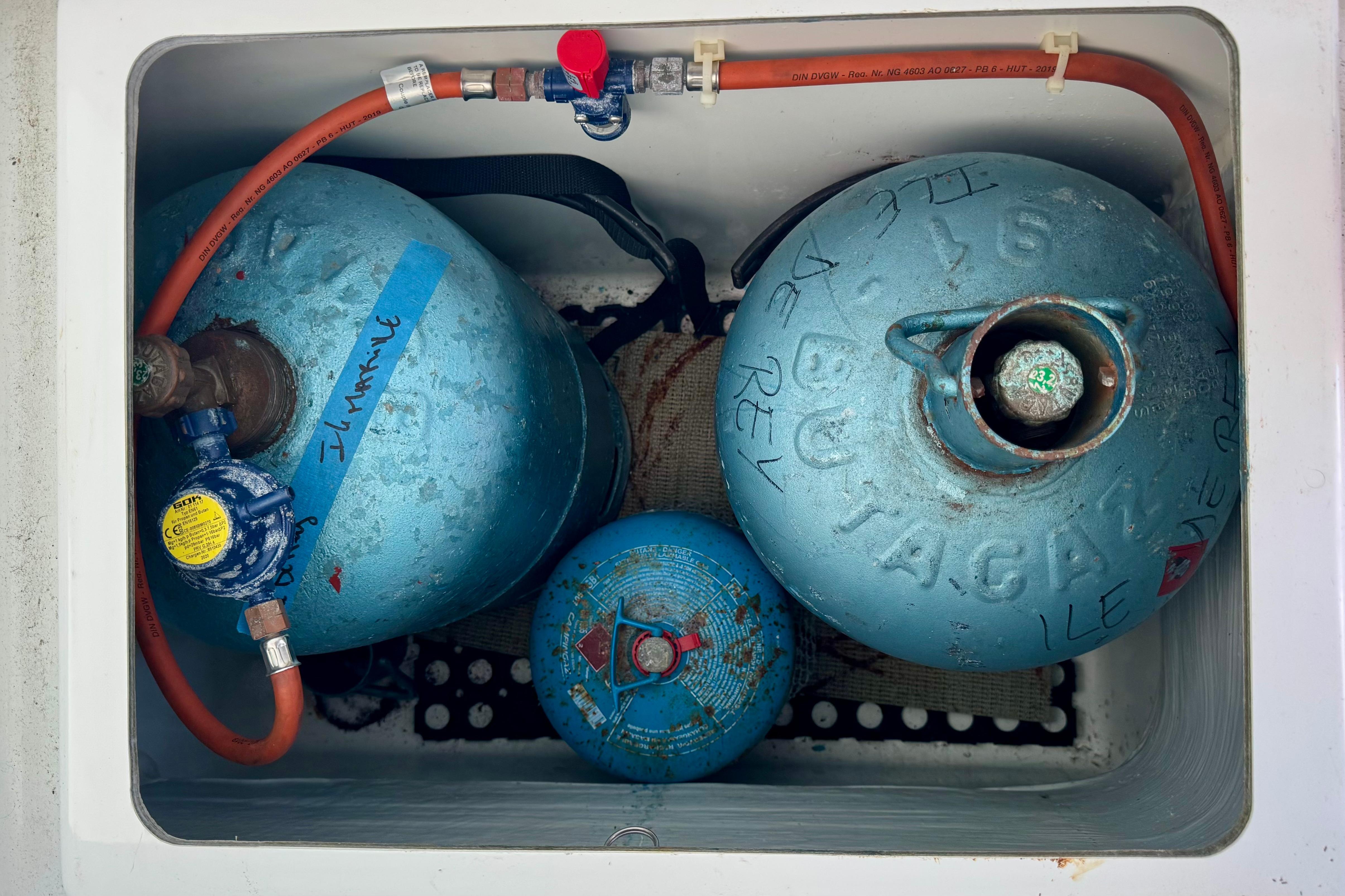 Propane tanks in storage compartment of 2020 Fountaine Pajot Saona 47 catamaran.
