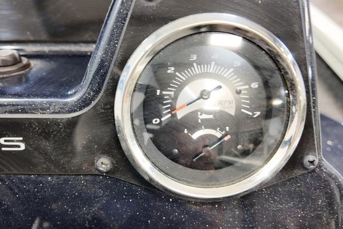 Close-up of 2024 Lowe Stinger 188 RPM gauge on dashboard.