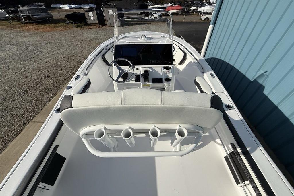 2026 Tidewater 198 CC Adventure boat interior with steering console and seating.