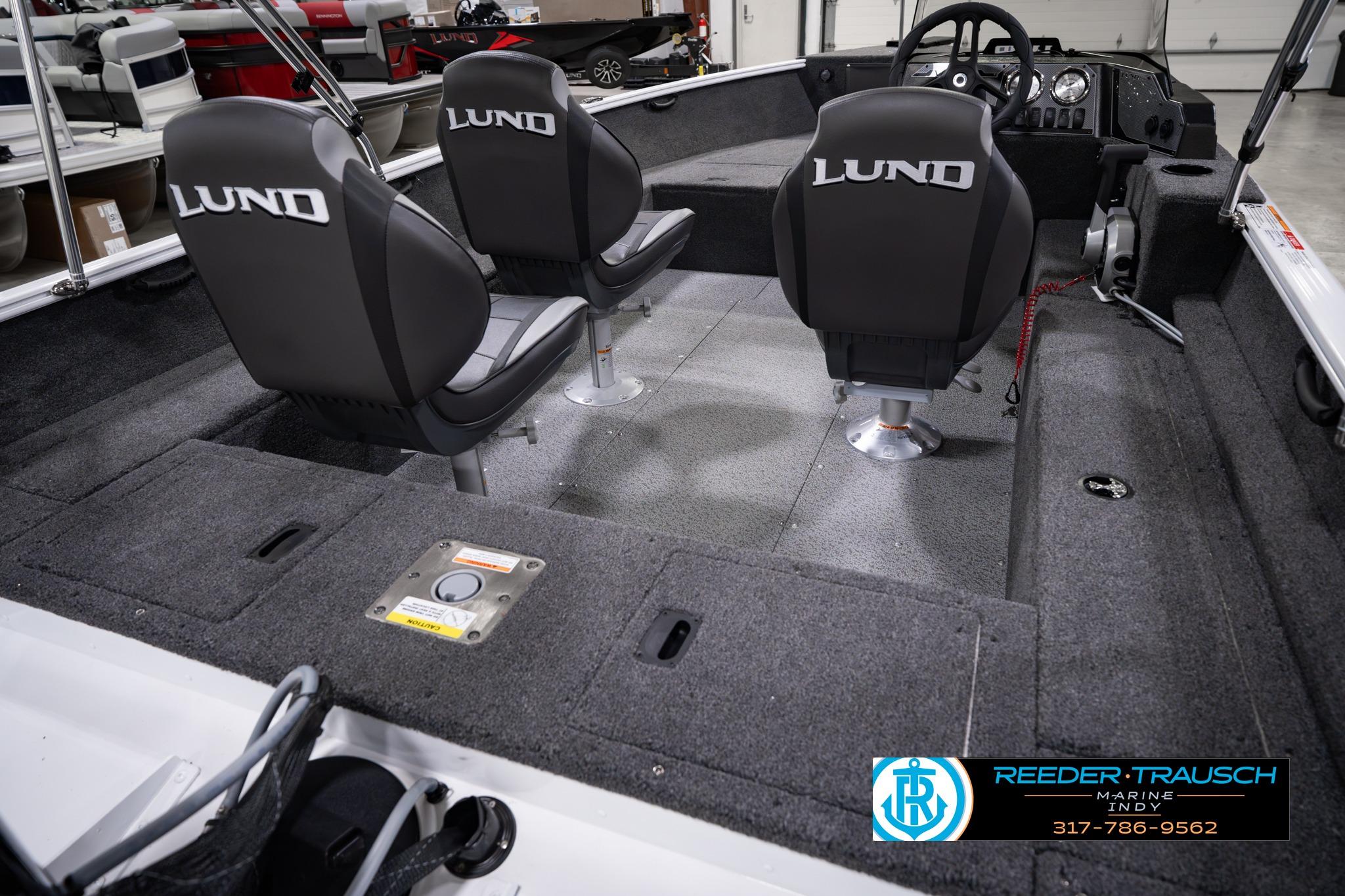 2026 Lund 1650 Rebel XL SS boat interior with two seats and steering console.