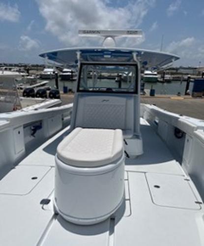 2022 Yellowfin 39 Offshore boat docked at marina under clear sky.