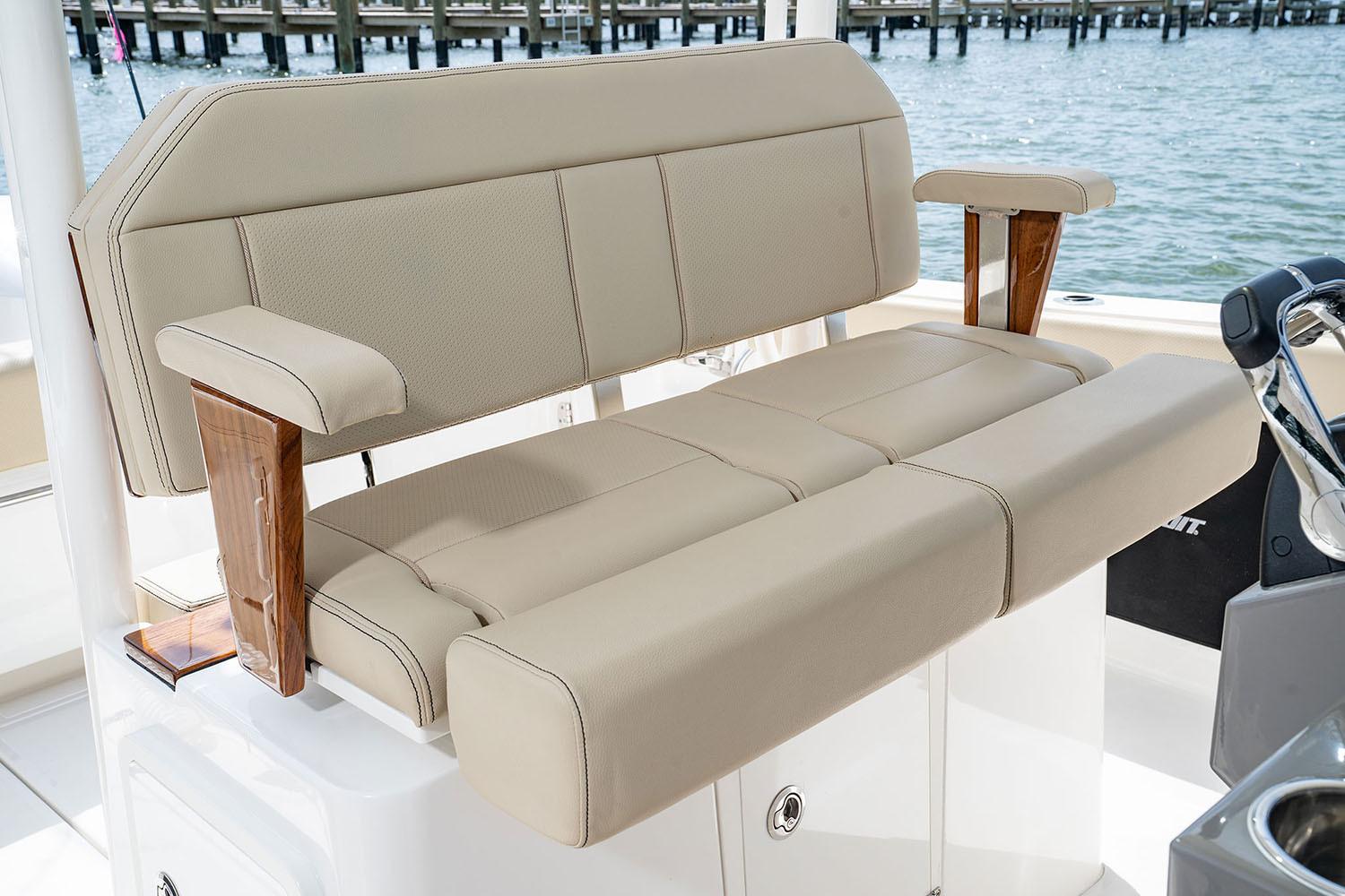 Manufacturer Provided Image: 2025 Pursuit S 288 Sport boat seating with beige upholstery and wooden armrests.