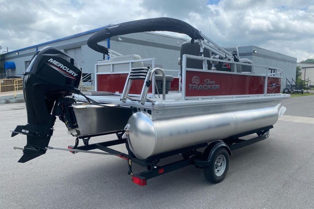 2026 Sun Tracker Bass Buggy 16 XL Select pontoon boat with Mercury outboard motor.