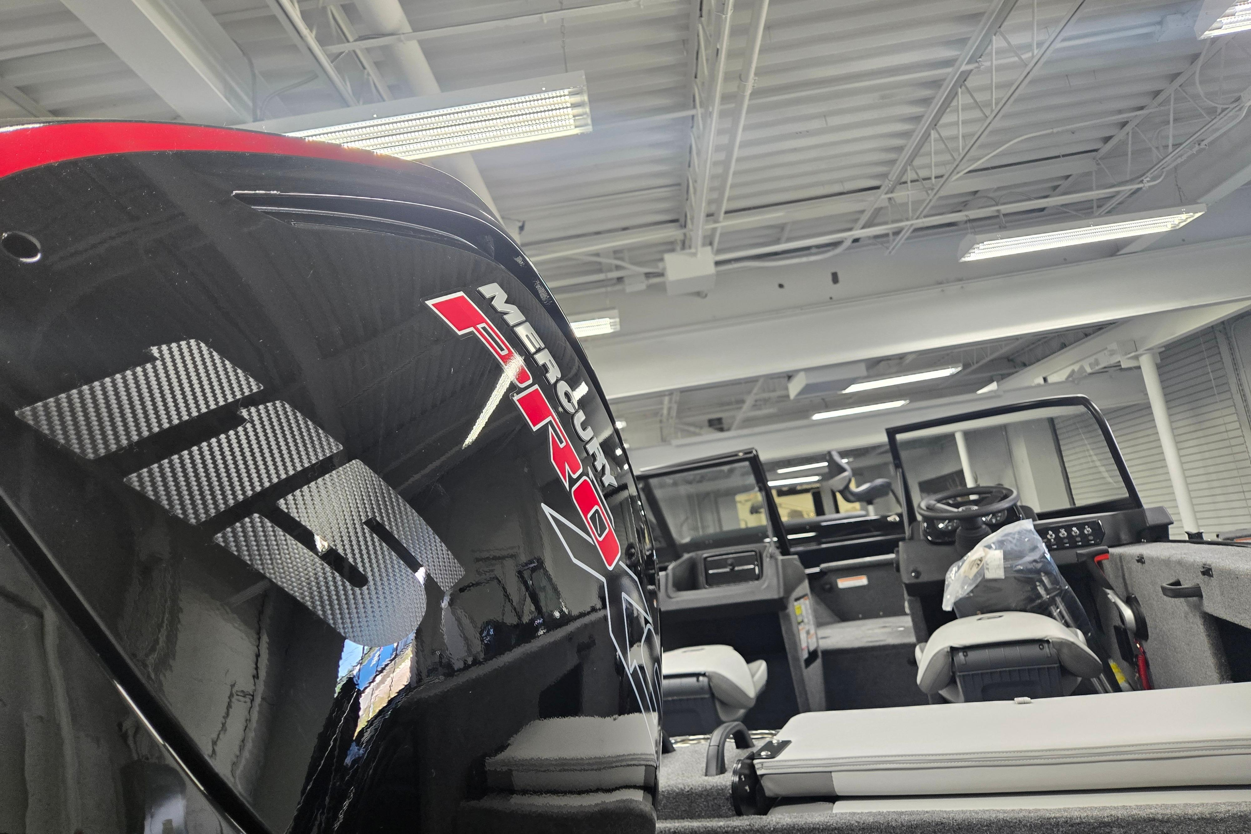 2026 Princecraft Sport 175 MAX boat with Mercury Pro engine in showroom.
