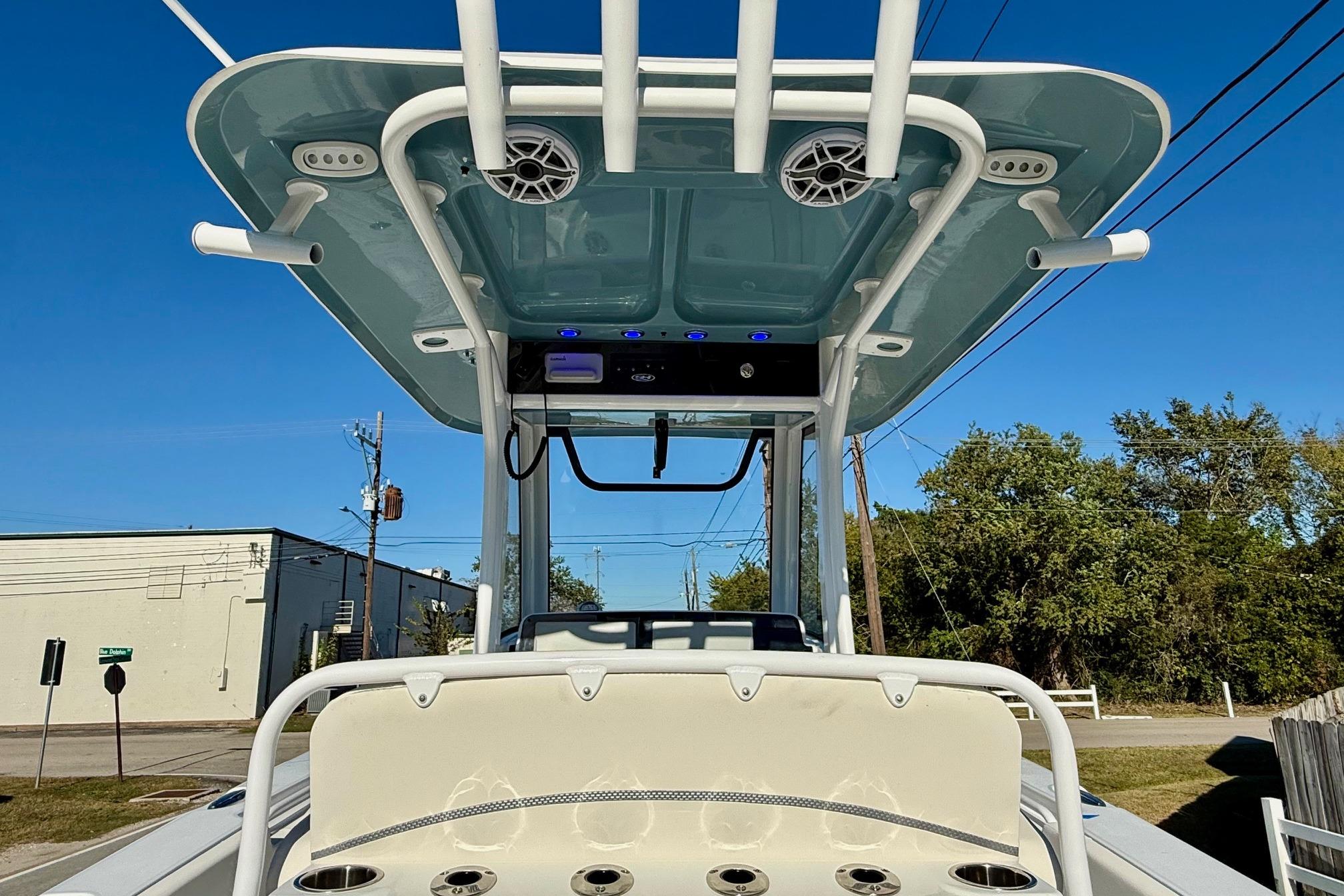 2026 Sea Hunt Ultra 275 Coffin Box boat with T-top and rod holders.