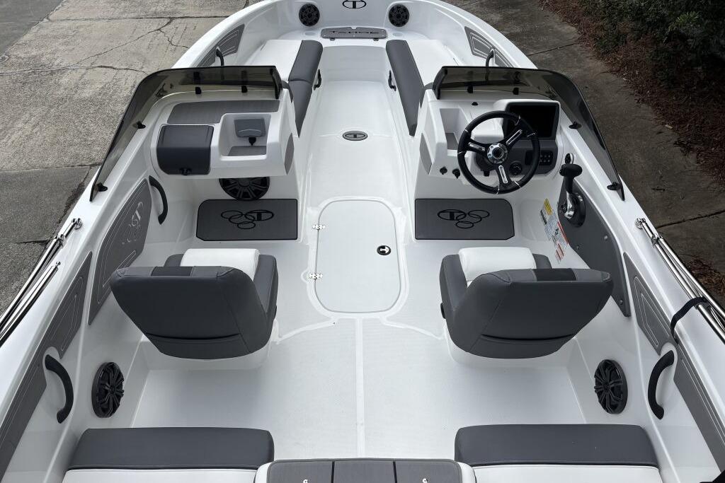 2026 Tahoe T21 boat interior with gray seating and modern steering console.