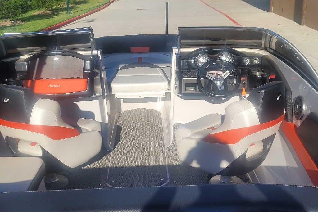 2016 Four Winns H200RS boat interior with modern dashboard and seating.
