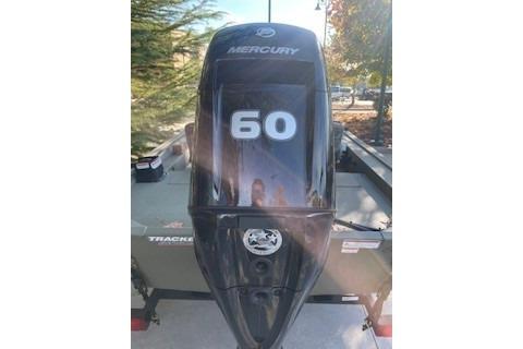 2026 Tracker Grizzly 1754 SC boat with Mercury 60 horsepower engine, outdoors.