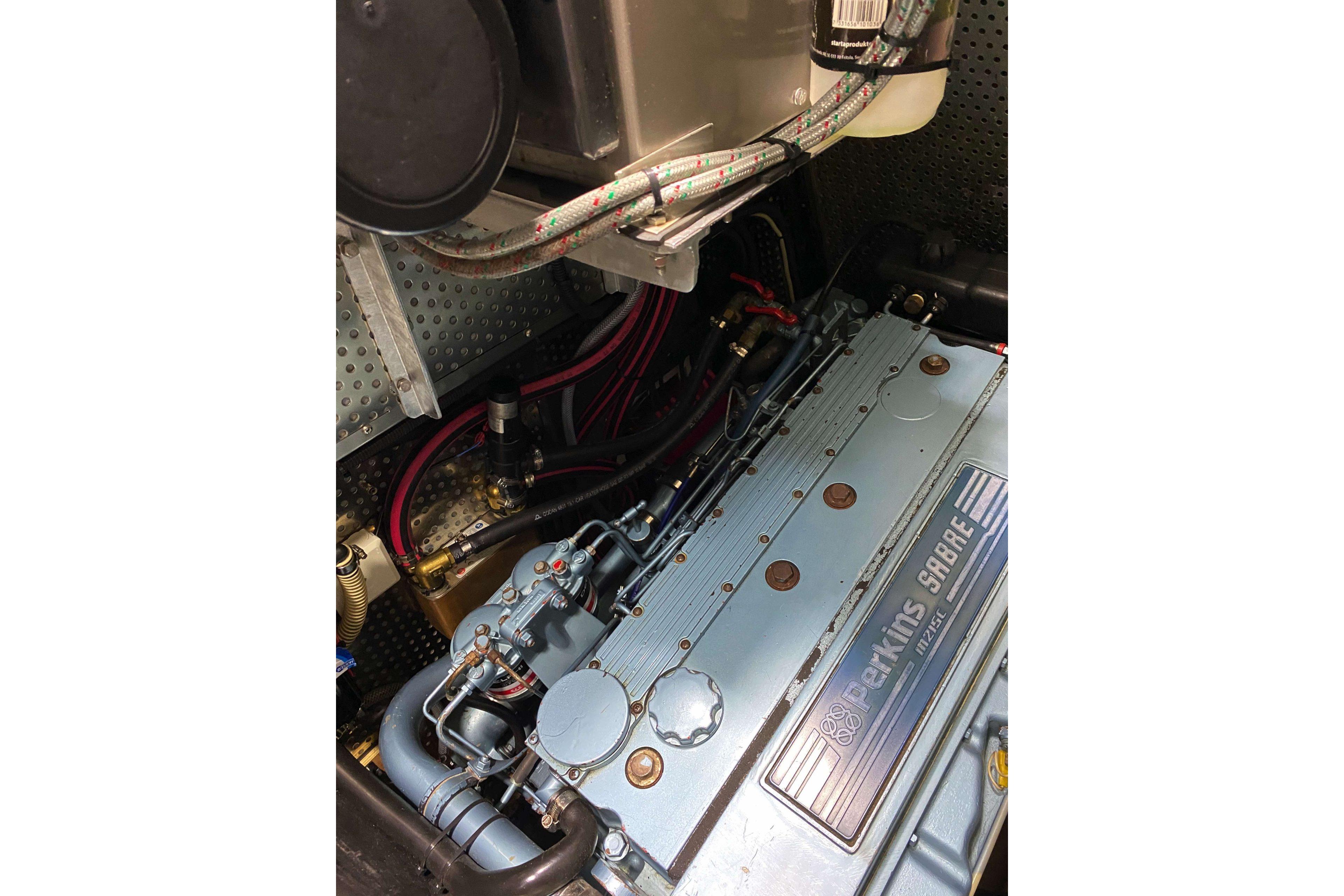 Engine compartment of a 1983 Swan 70 yacht with Perkins Sabre engine.