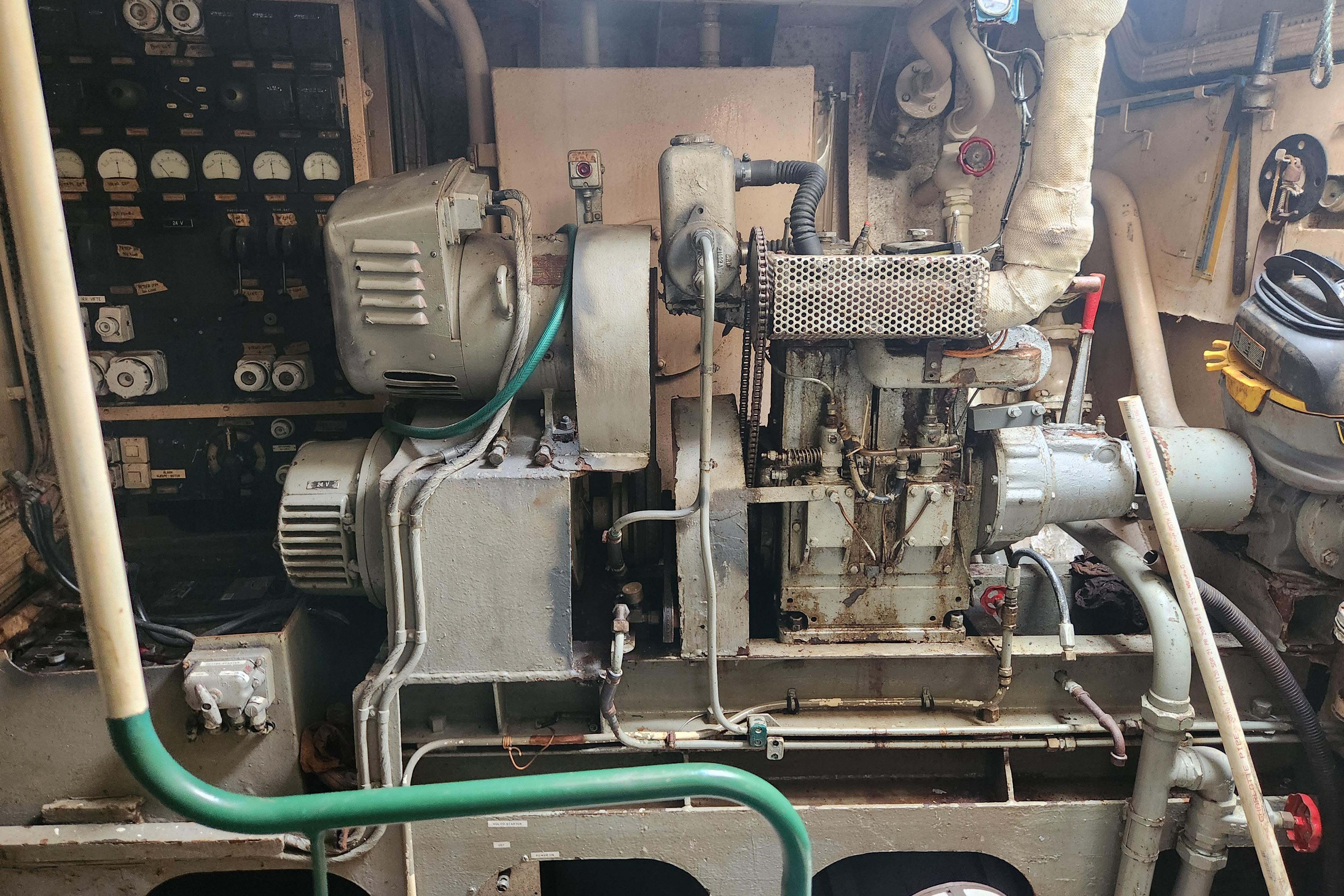Engine room of a 1960 Stord Verft model 60, showcasing vintage machinery and controls.